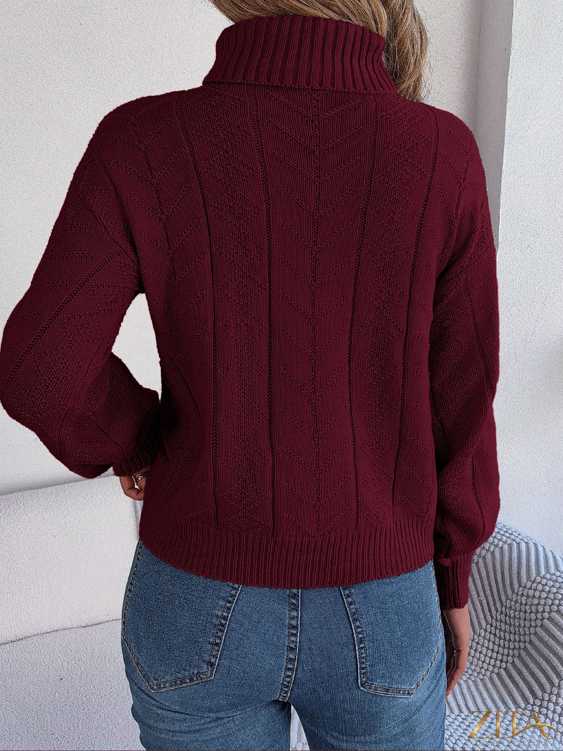 Zita La Belle Elite cable-knit turtleneck sweater in cozy wool, featuring a textured pattern and high neckline for warmth and style.