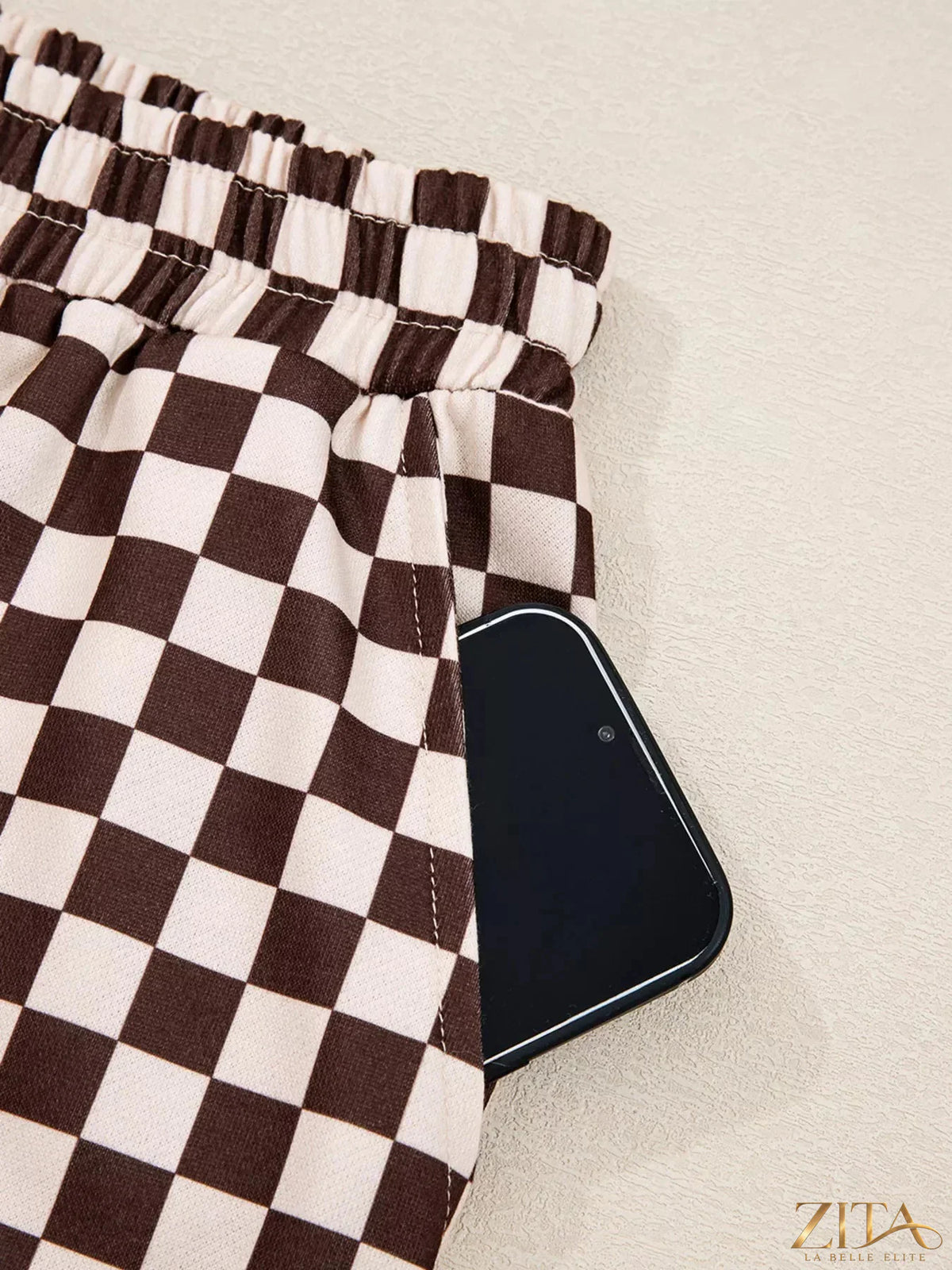 Checkered Zita La Belle Elite hoodie and pants set with drawstrings, casual loungewear, black and white pattern, front view.