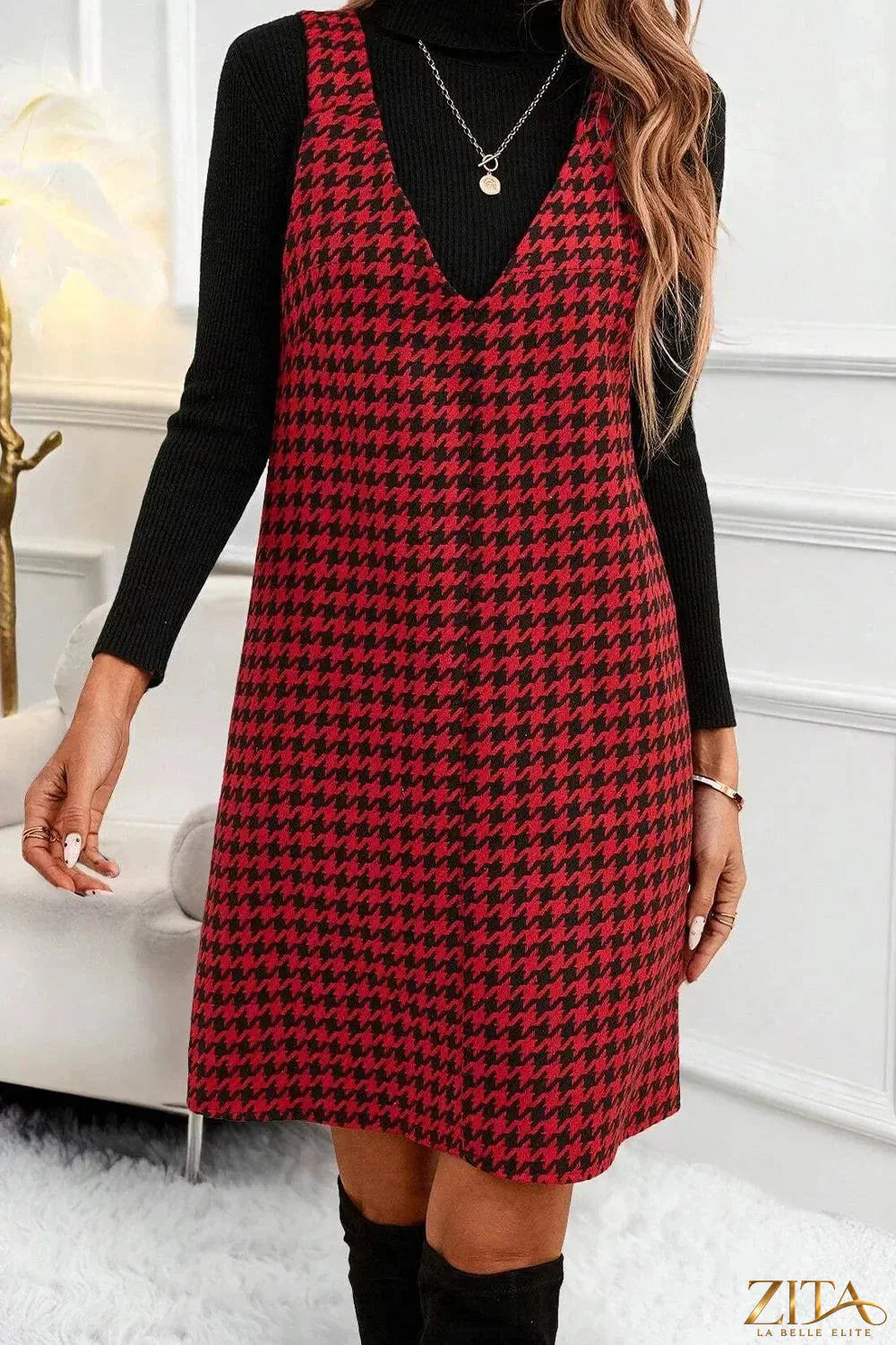 Houndstooth V-neck sleeveless mini dress by Trendsi featuring a fitted silhouette and classic pattern.