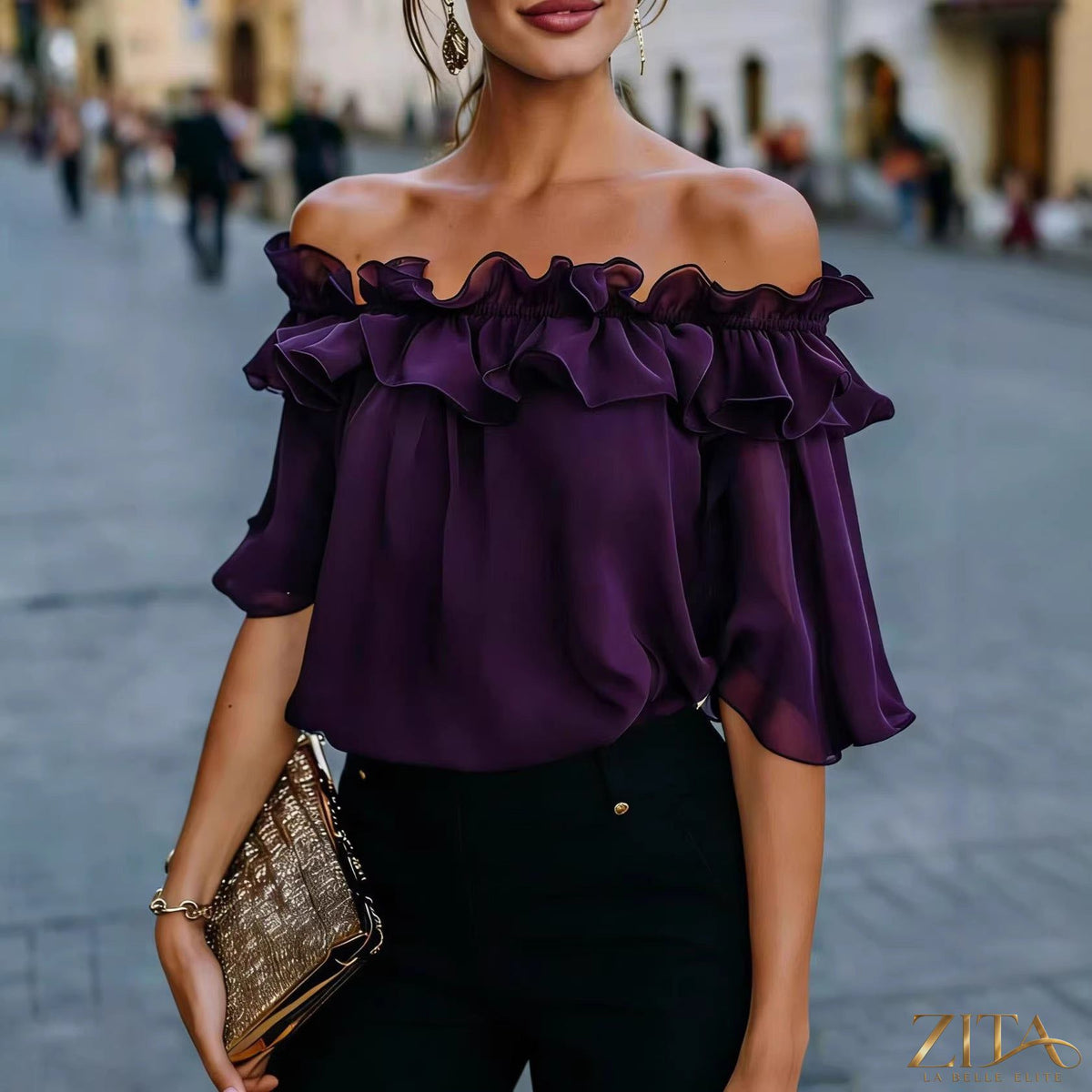 Women's loose-fit minimalist short-sleeve casual shirt by Zita La Belle Elite, shown in a relaxed fit and simple design.