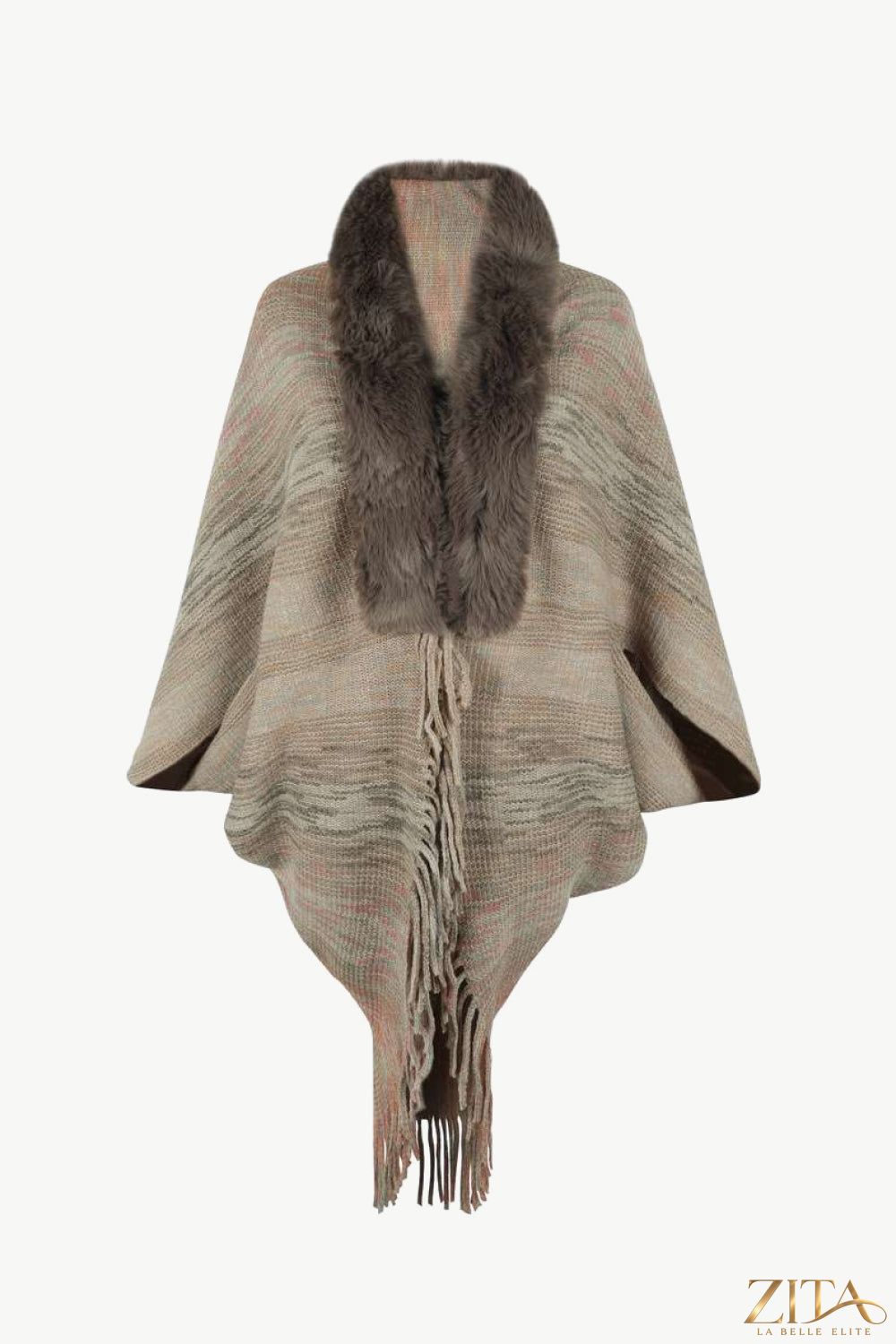 Open front fringe hem poncho from Trendsi, showing lightweight fabric with fringe details and a relaxed, flowy fit.