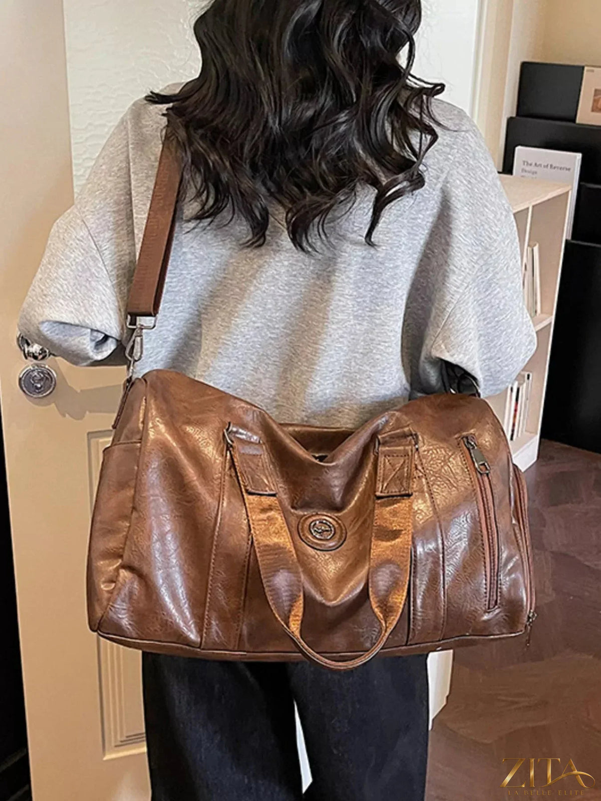 Trendsi PU leather duffel bag with sturdy handles and spacious main compartment, ideal for travel and weekend trips