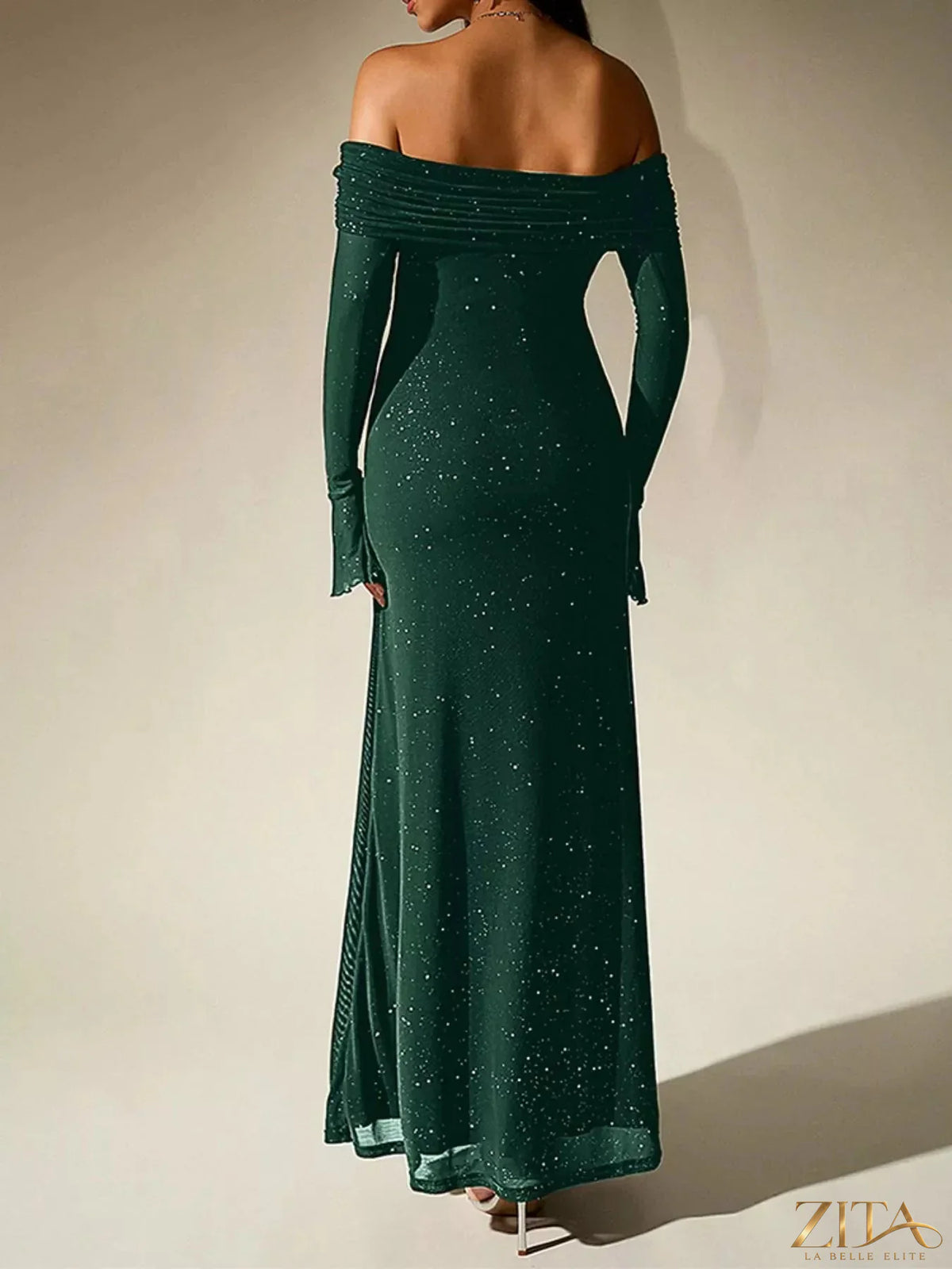Zita La Belle Elite glitter off-shoulder maxi dress with flowing fabric and shimmering details, perfect for elegant evening wear.