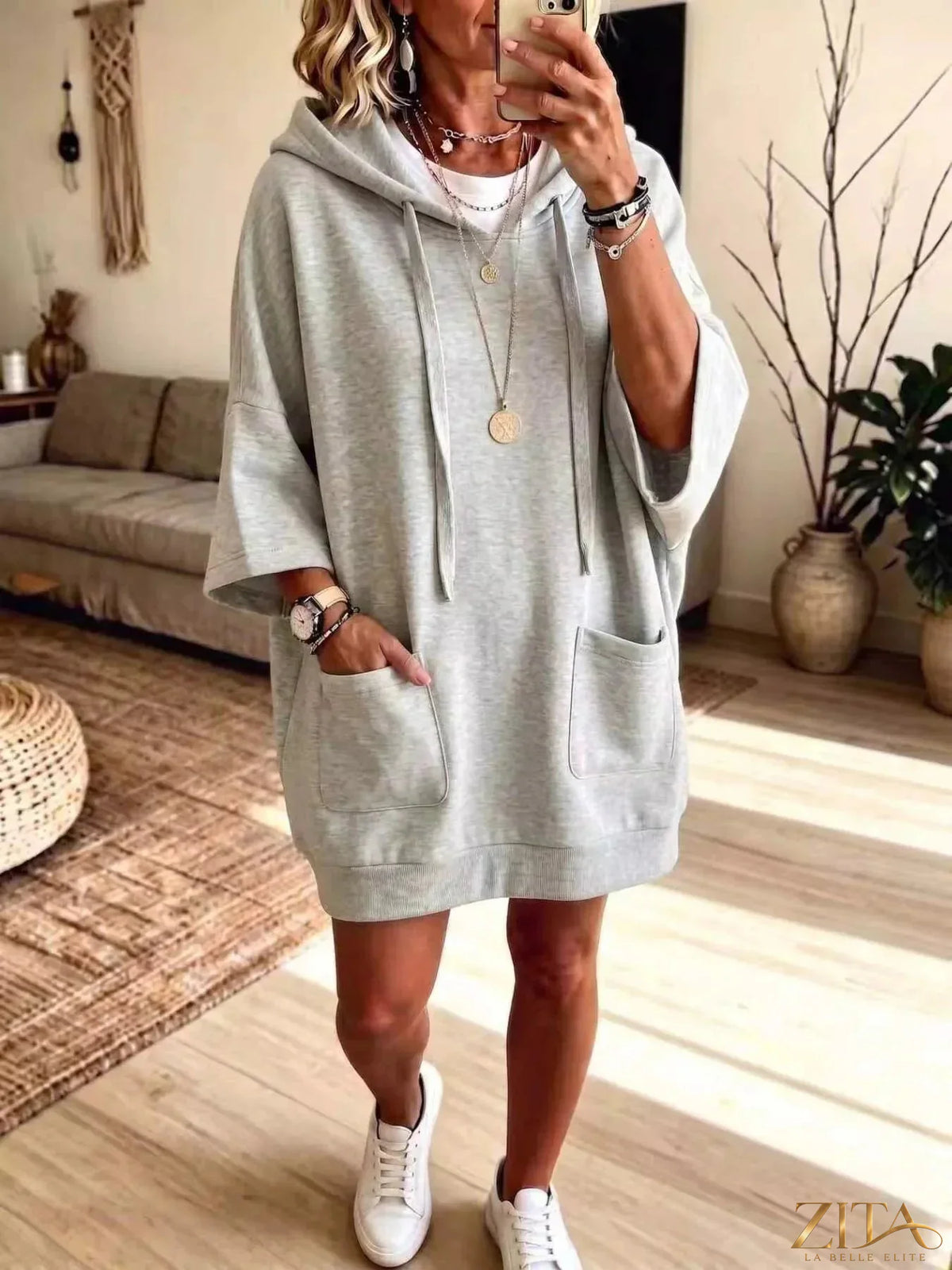 Plus size oversized drawstring hoodie by Zita La Belle Elite with front pockets, comfortable and stylish for casual wear.