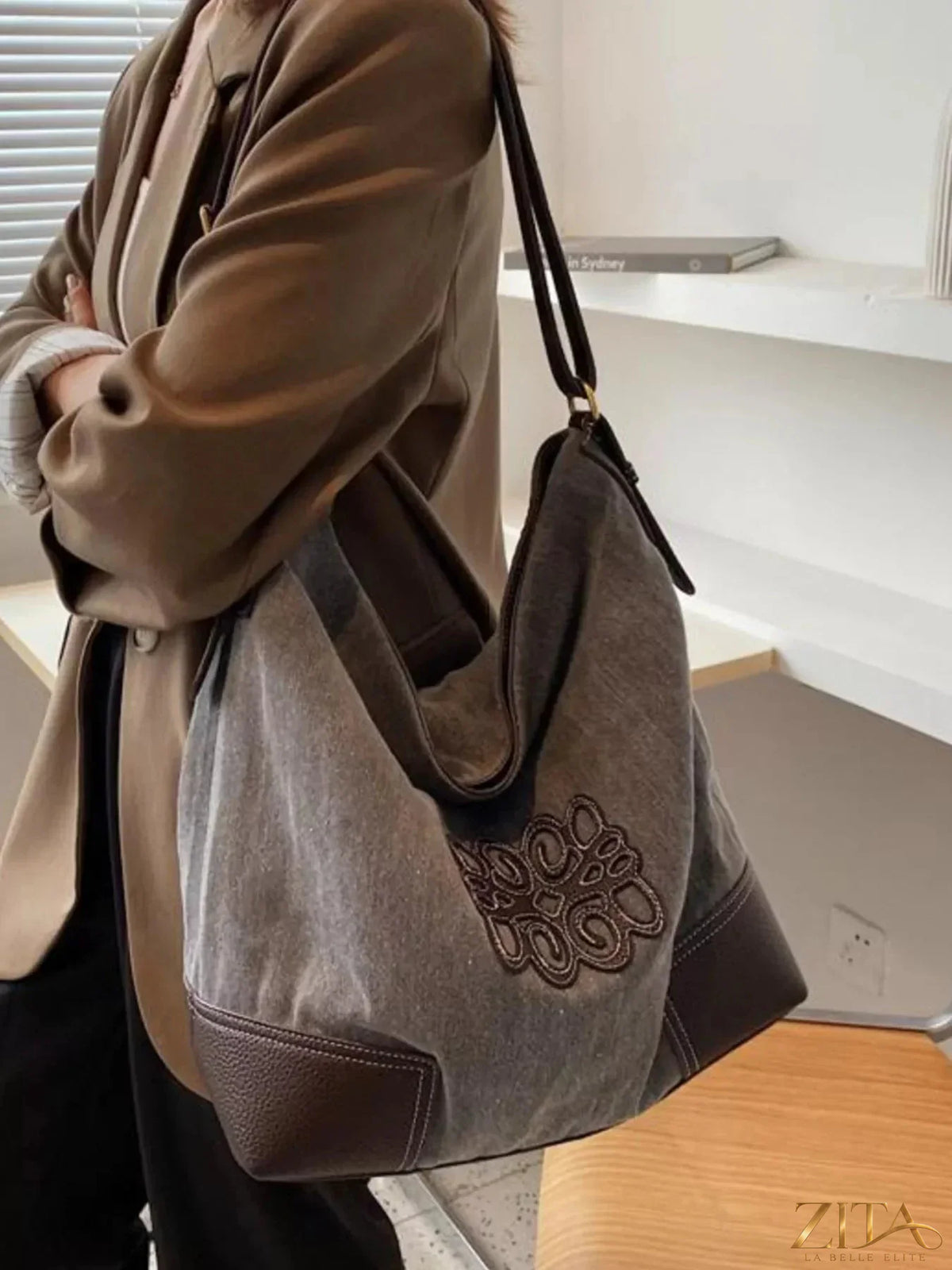 Embroidered canvas tote bag by Zita La Belle Elite, featuring colorful floral embroidery and sturdy handles.