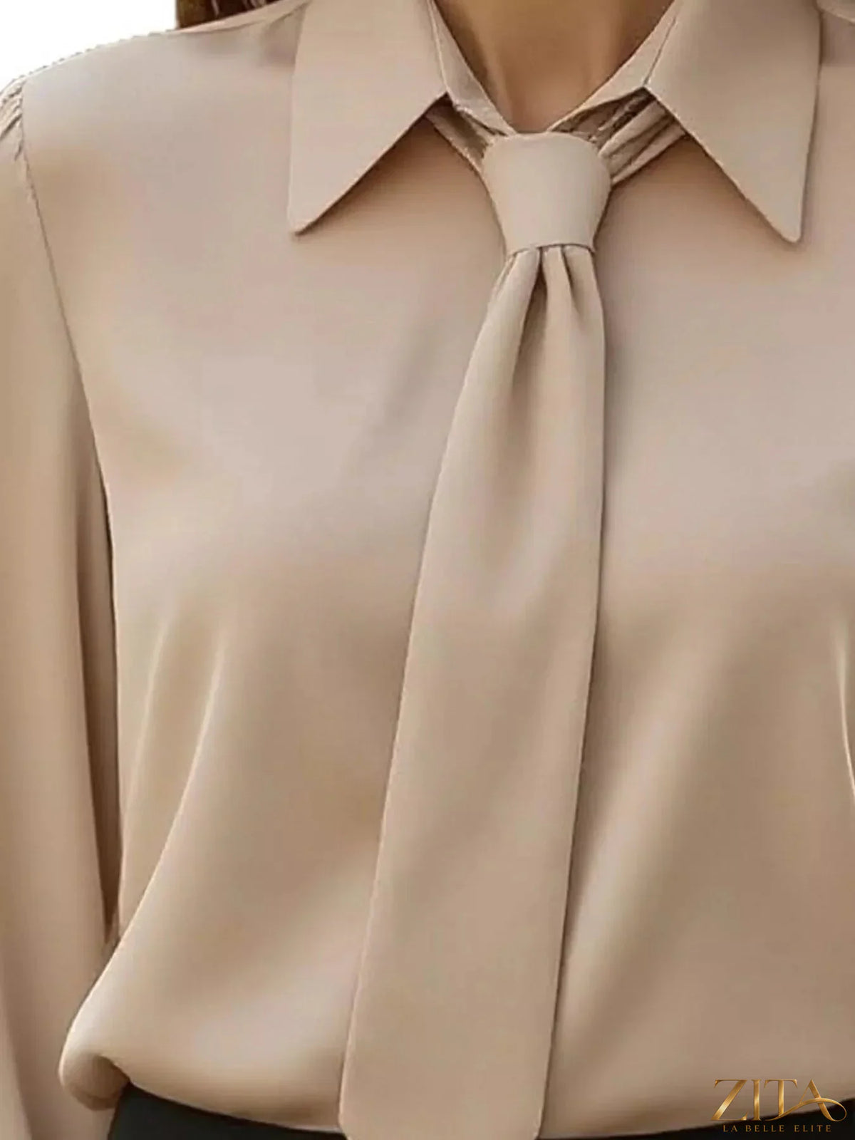Zita La Belle Elite tie-neck long sleeve blouse in a stylish design, featuring a tied collar and elegant fit.