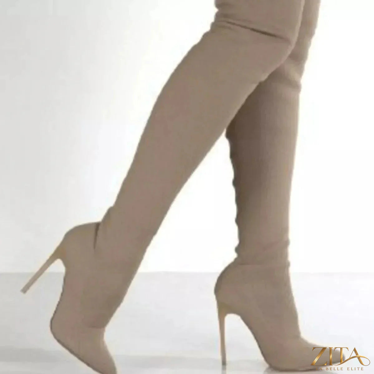 Point toe stiletto boots by Trendsi featuring sleek design and high heels, perfect for stylish outfits and evening wear.