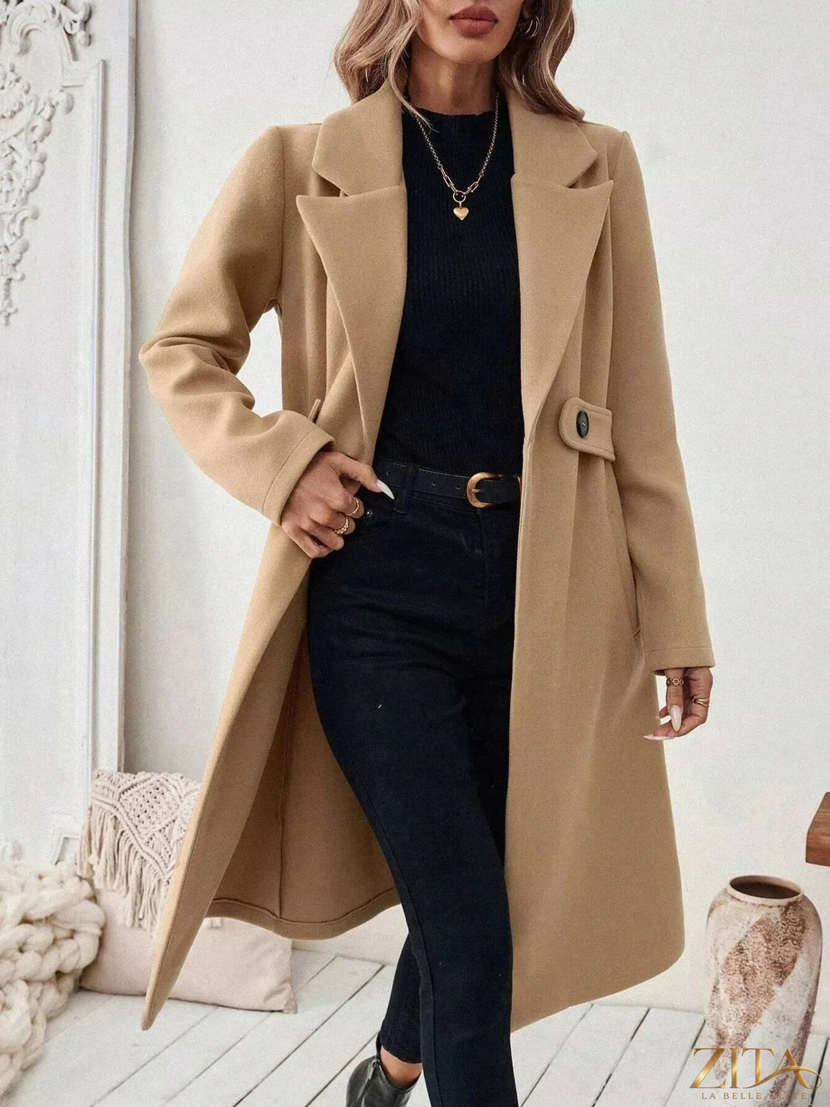 Zita La Belle Elite one-button lapel collar overcoat in classic style, shown hanging on a wooden hanger.