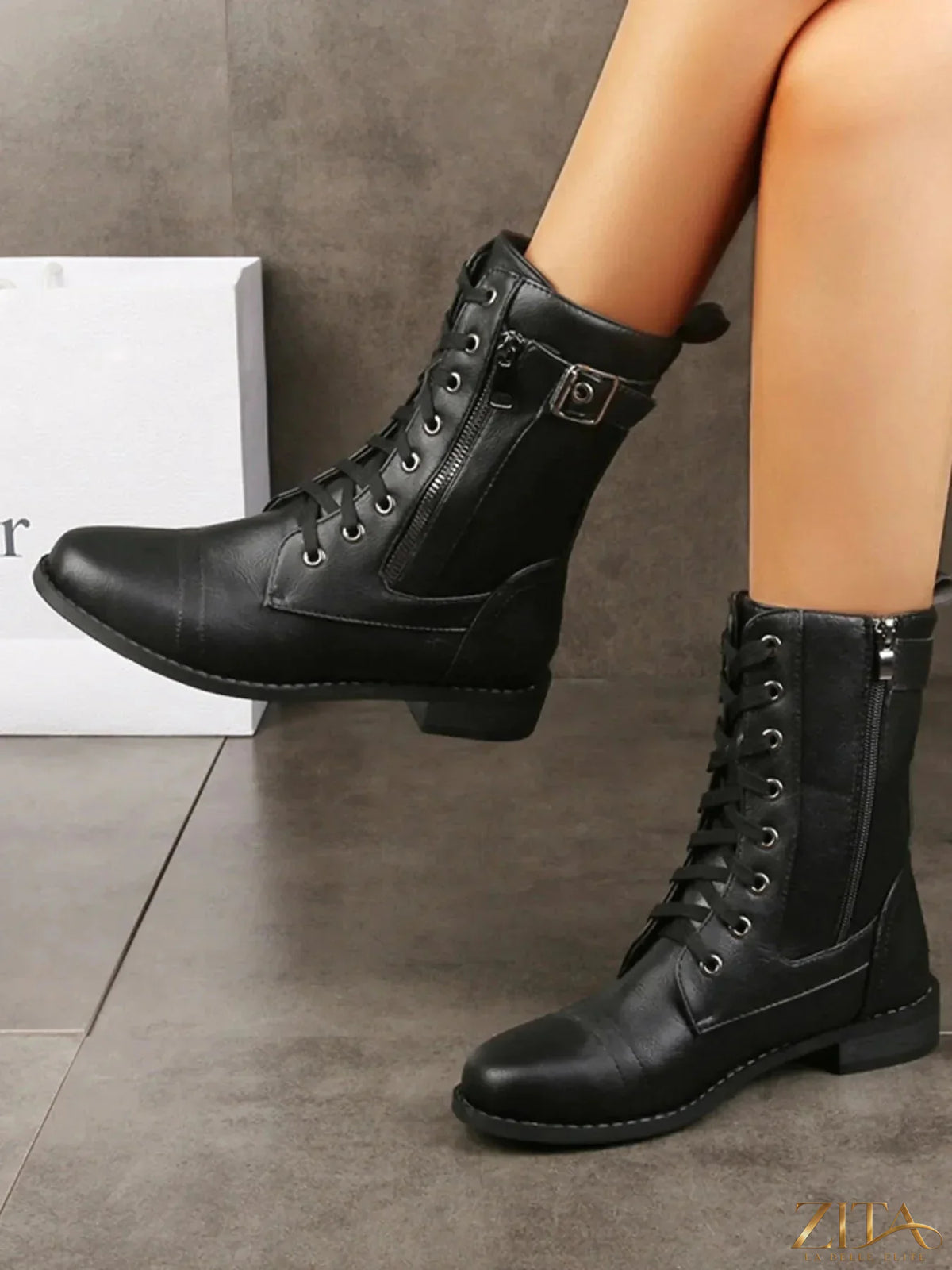 Zita La Belle Elite lace-up boots with buckle details, black leather, stylish ankle design, and sturdy sole.