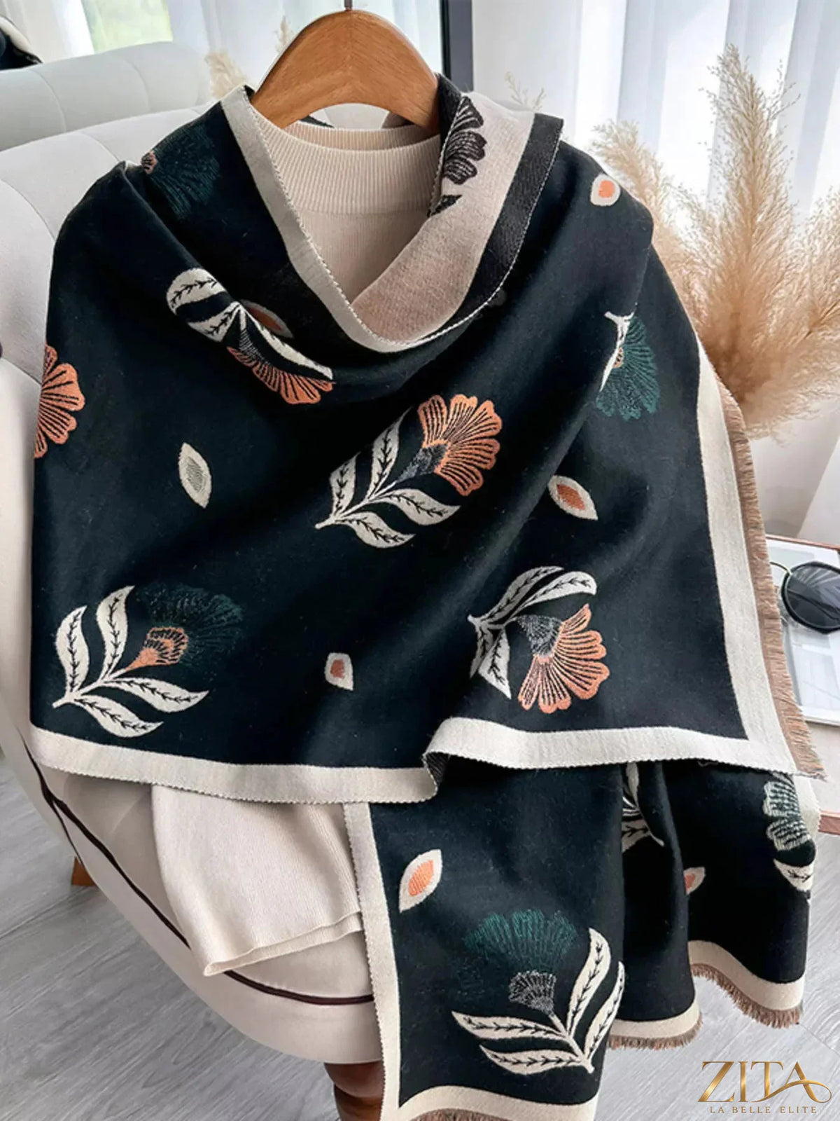 Printed raw hem shawl by Zita La Belle Elite, featuring a lightweight fabric with a stylish, raw edge hem and intricate printed design.