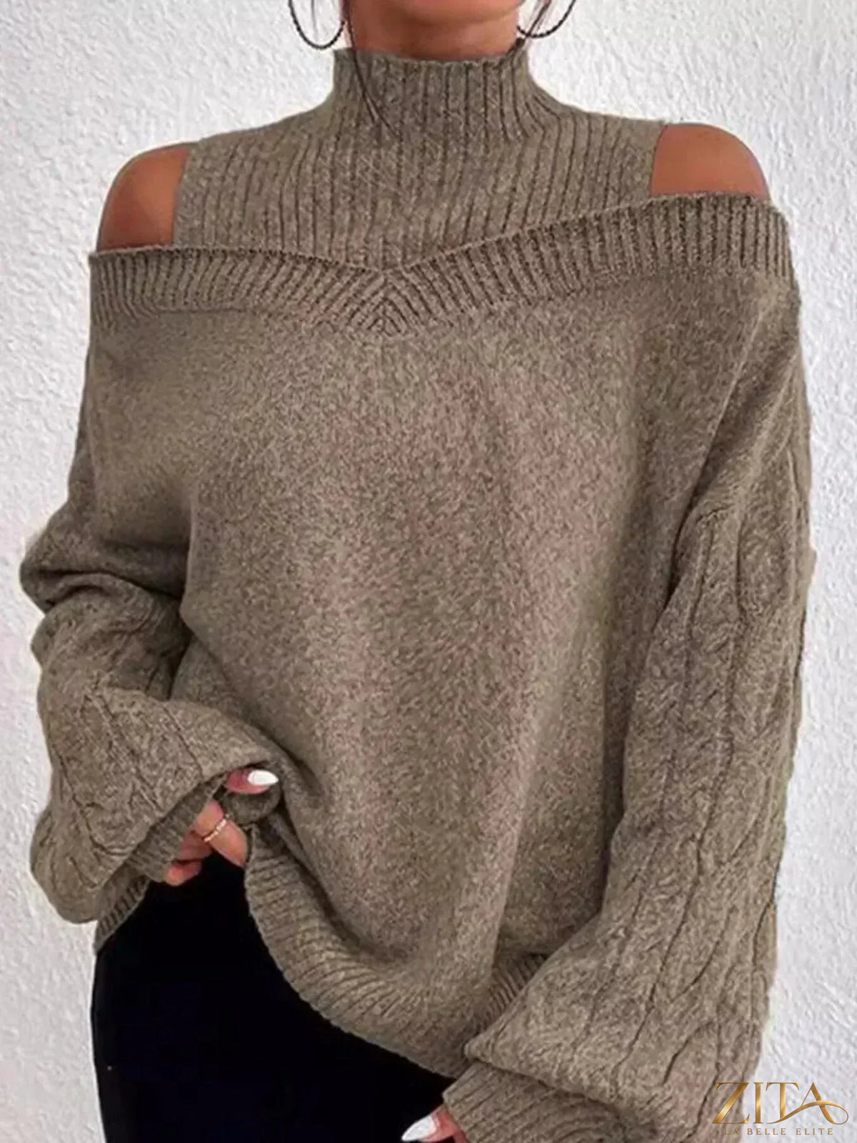 Zita La Belle Elite cold shoulder turtleneck sweater in cozy knit with cut-out shoulder design and high neckline.