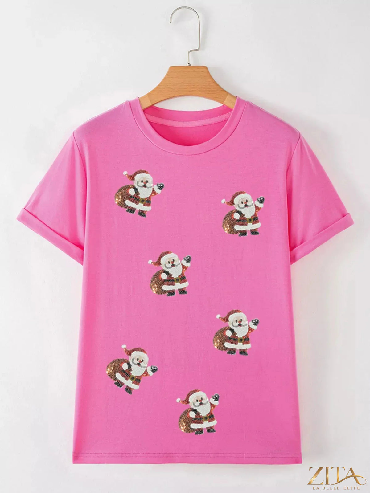 Santa Claus deliver gifts sequin short sleeve tee by Trendsi, featuring a festive Santa design with shiny sequins on a white fabric background.