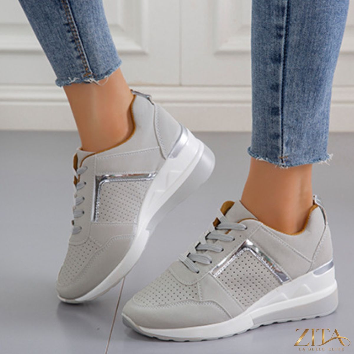 Zita La Belle Elite lace-up wedge sneakers with stylish design, white and beige color, and chunky sole for casual wear.