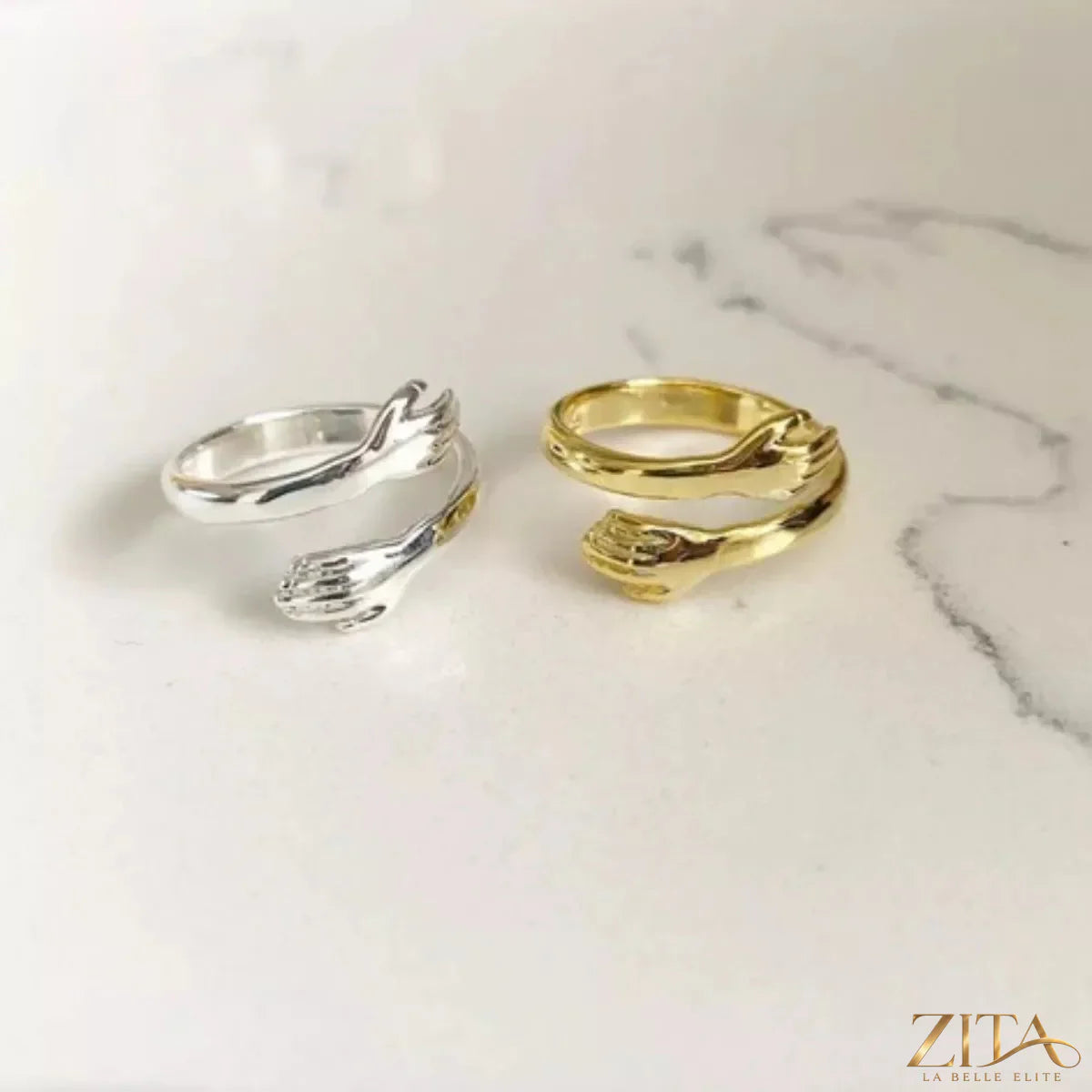 Sterling silver hug bypass ring by Zita La Belle Elite featuring a sleek, modern design with smooth, intertwined bands.
