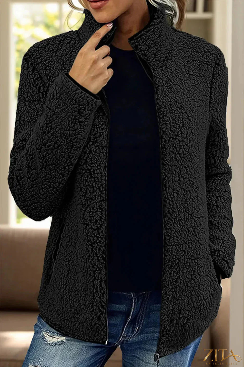 Trendsi pocketed zip-up turtleneck jacket featuring a fitted design and front pockets, made of soft, stretchy fabric.