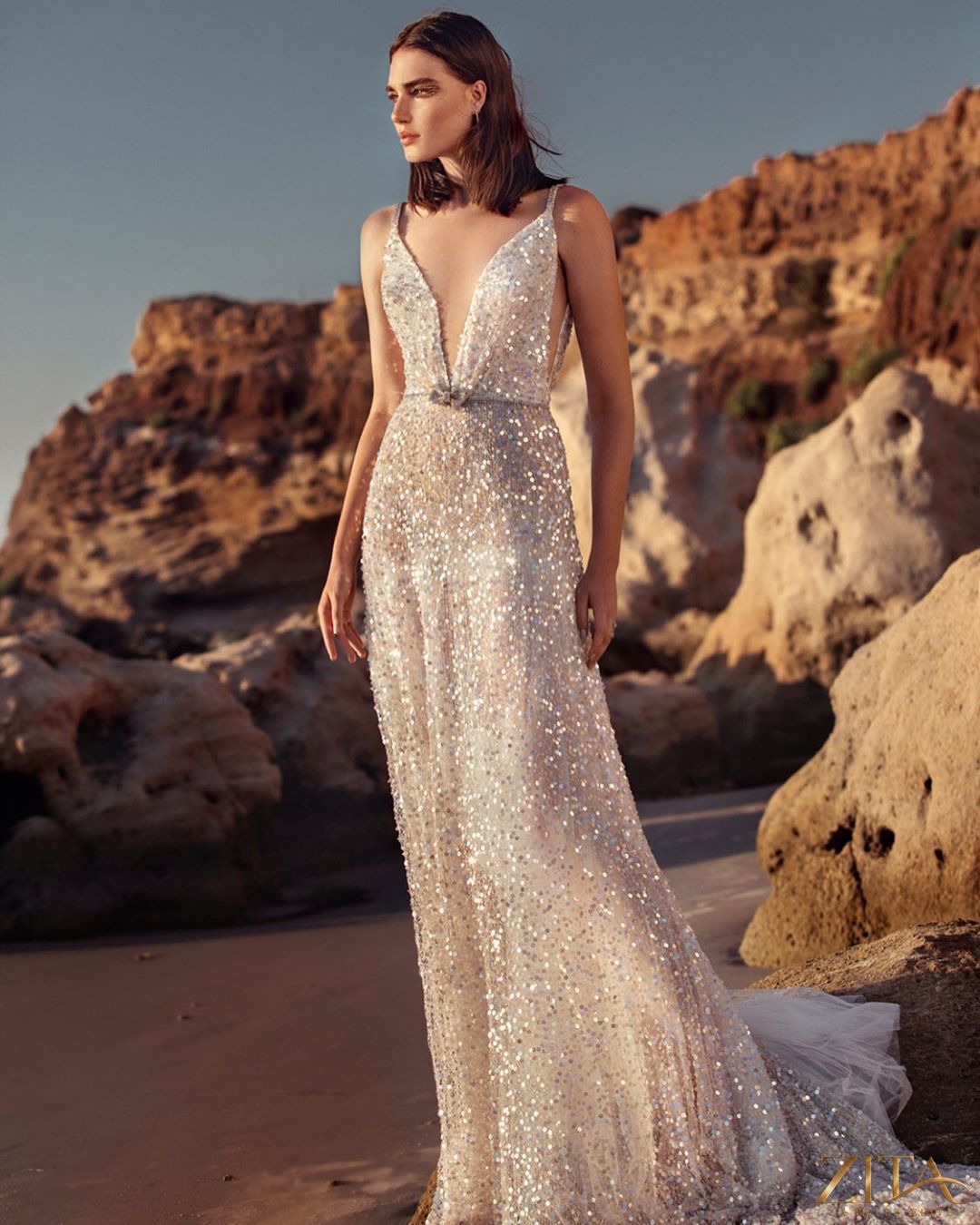 Silver sequin V-neck sleeveless camisole gown by Zita La Belle Elite, featuring elegant fabric and a flowing silhouette.