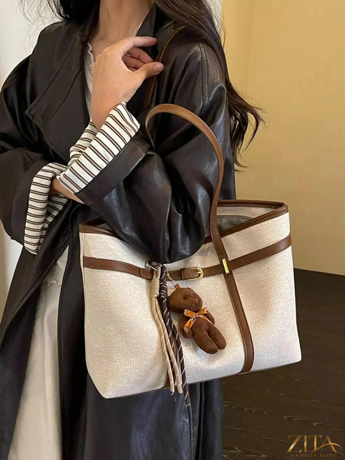 Zita La Belle Elite decorative buckle tote bag with a stylish design, featuring a prominent buckle and spacious interior.