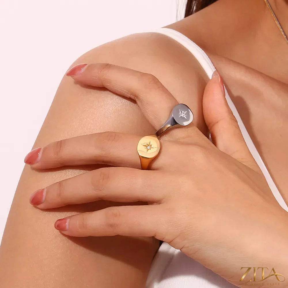 Close-up of Zita La Belle Elite minimalist North Star signet ring with engraved star detail on polished silver band.