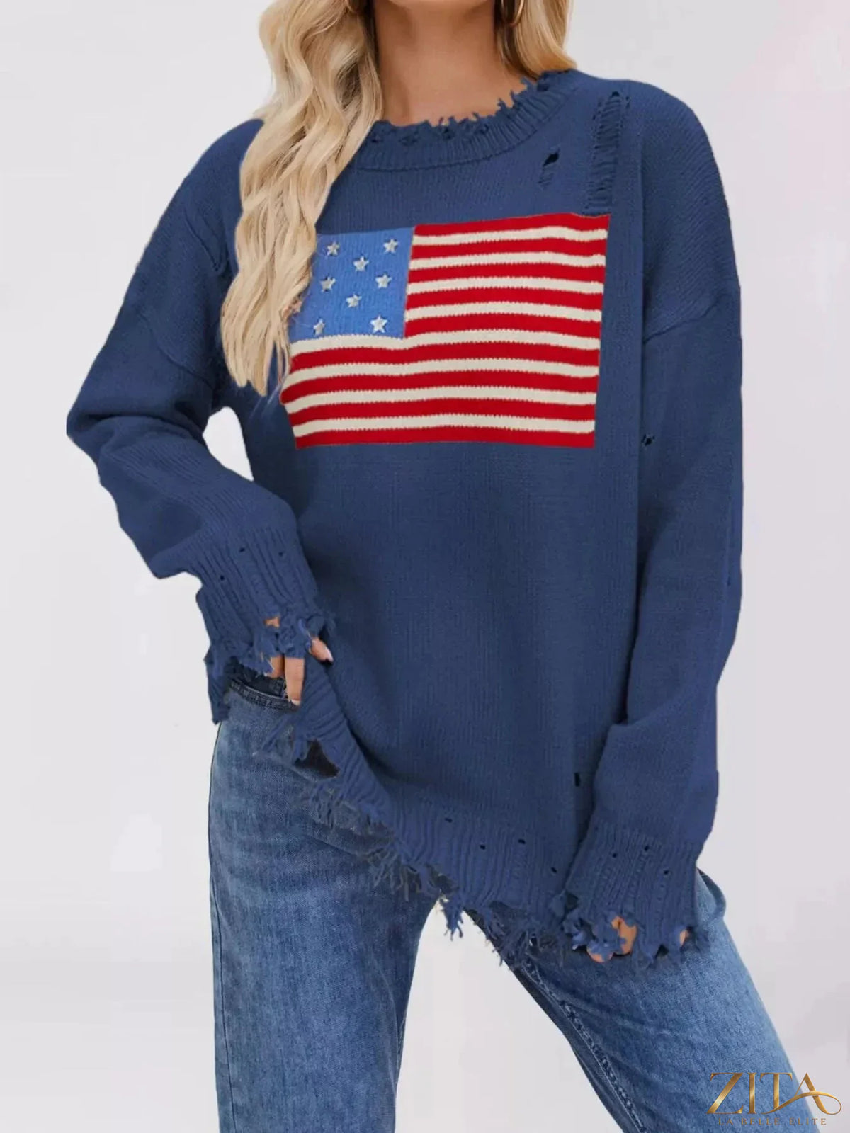 Distressed American flag graphic sweater by Trendsi featuring a cozy knit design with bold patriotic flag print.