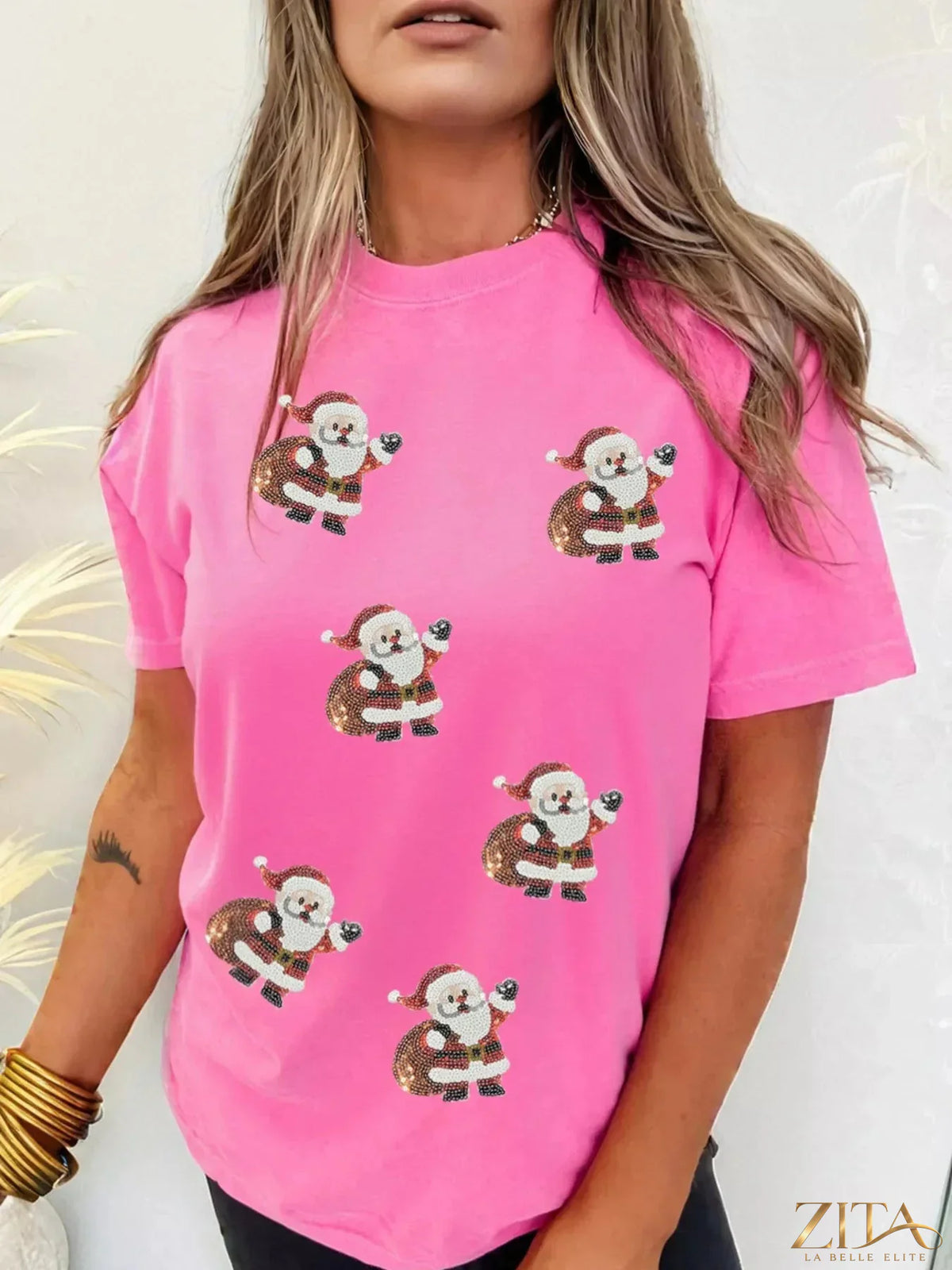 Santa Claus deliver gifts sequin short sleeve T-shirt from Trendsi, featuring a festive holiday design with shiny sequins.