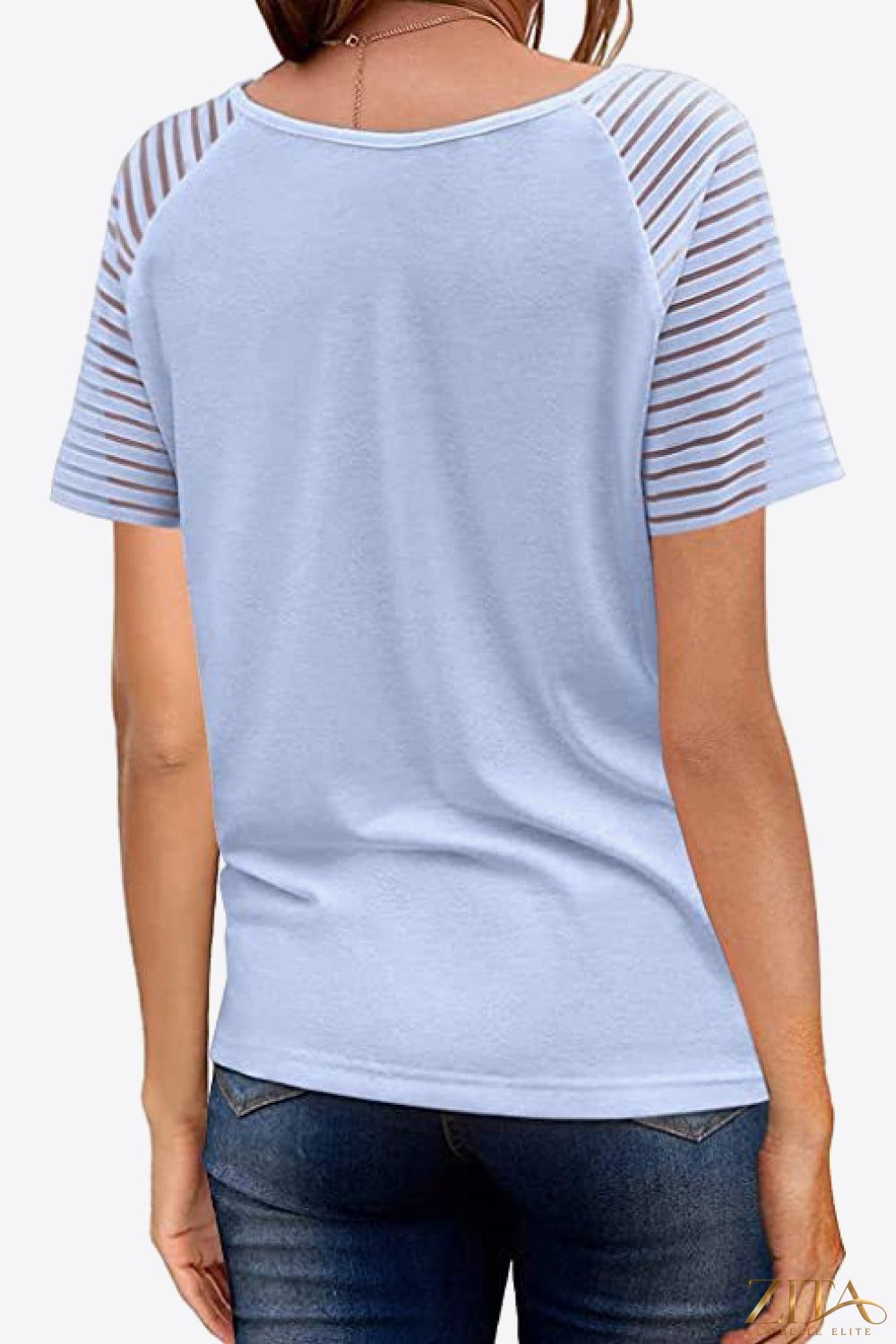 V-neck raglan sleeve tee from Trendsi, featuring a casual fit with contrasting sleeve colors and a soft, comfortable fabric.