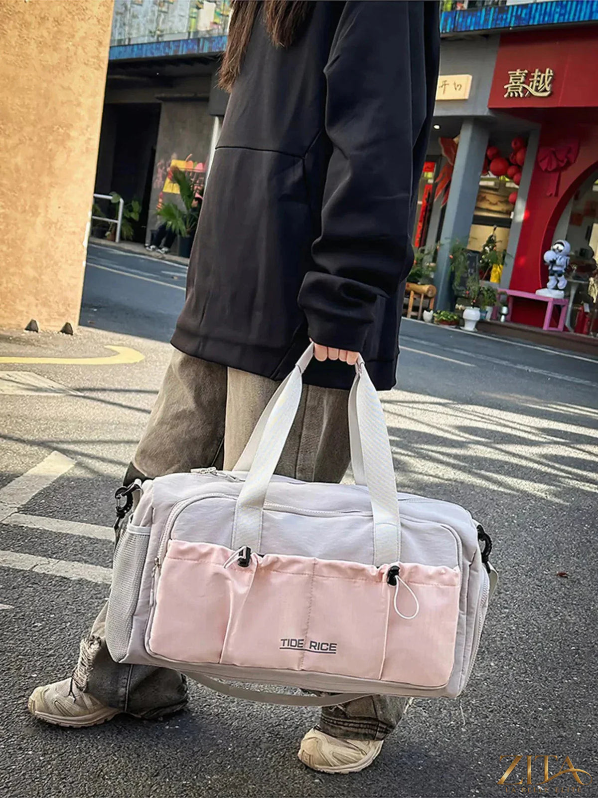 Zita La Belle Elite drawstring travel bag with multiple pockets, featuring a stylish design and functional storage compartments.
