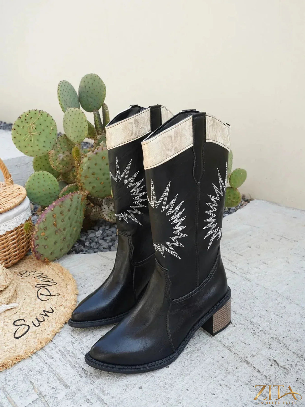 Zita La Belle Elite point toe block heel boots showing sleek black leather with a modern design and sturdy block heel.
