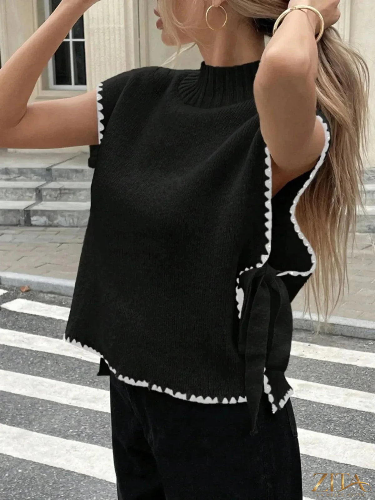 Ribbed turtleneck sweater vest with contrast trim in neutral colors, stylish and cozy from Trendsi.