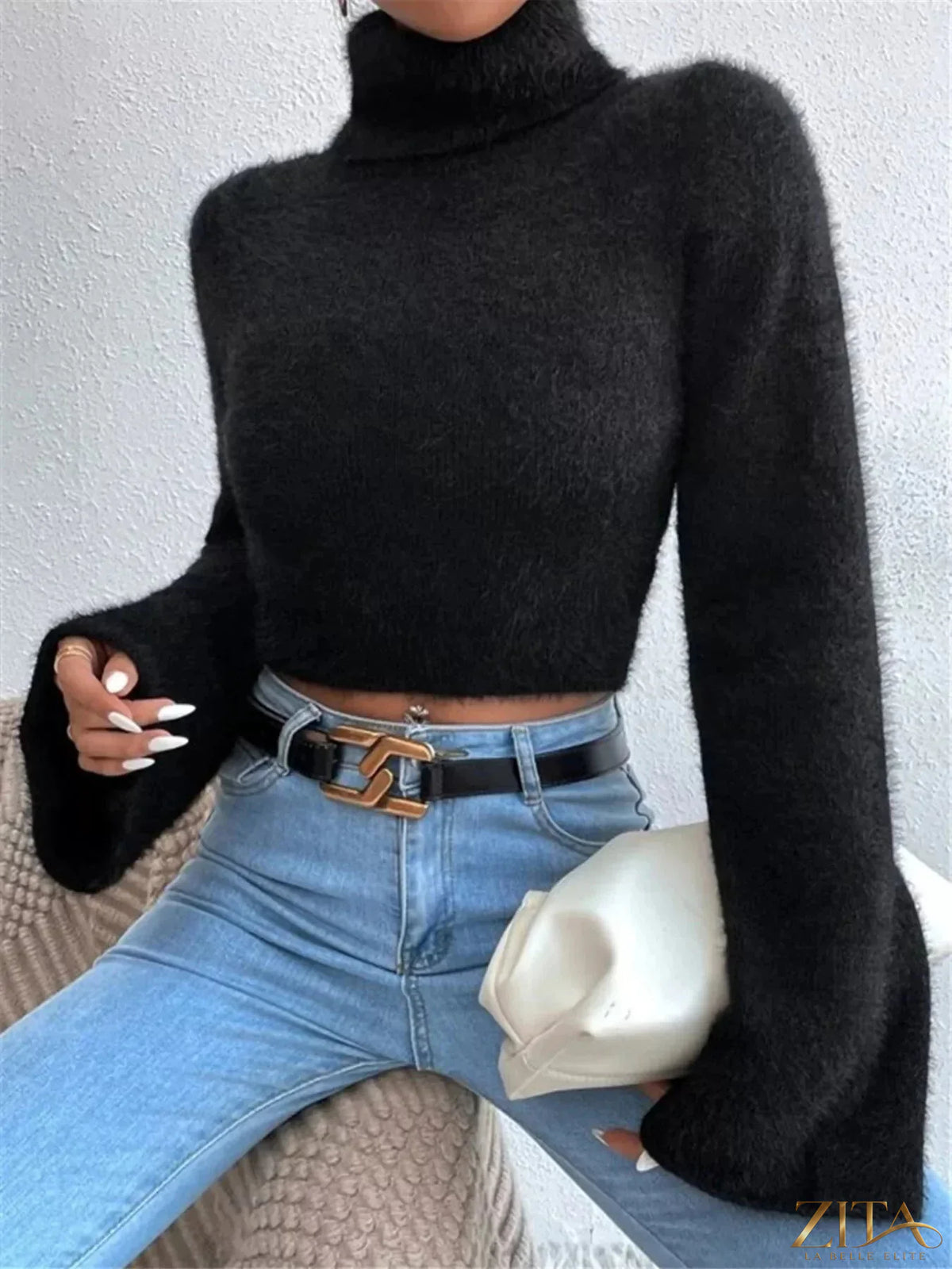 Trendsi turtleneck flare sleeve sweater featuring a fitted bodice and dramatic flared sleeves in soft knit fabric.