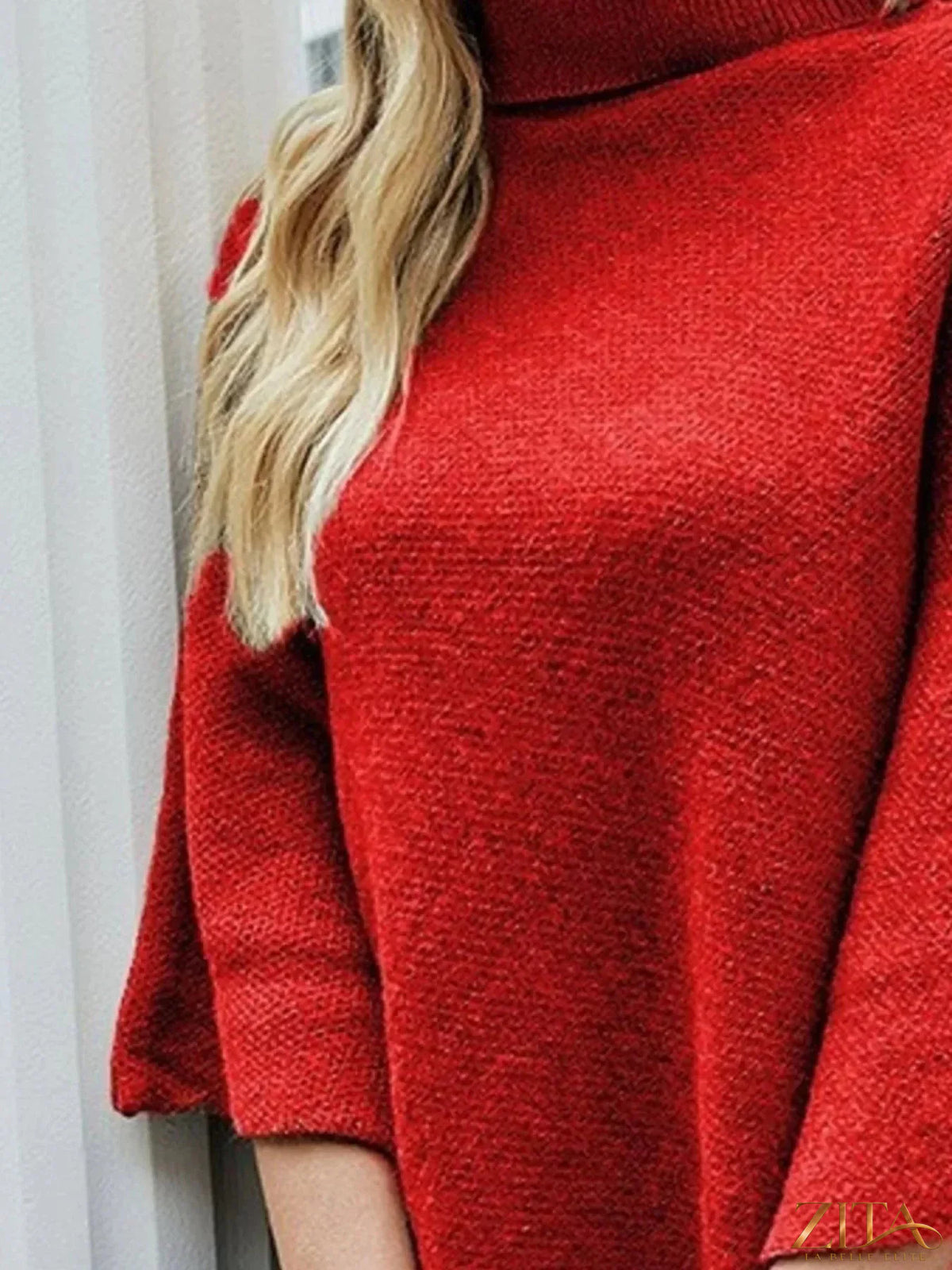 Zita La Belle Elite button-decor turtleneck poncho pullover in cozy knit fabric with decorative buttons.