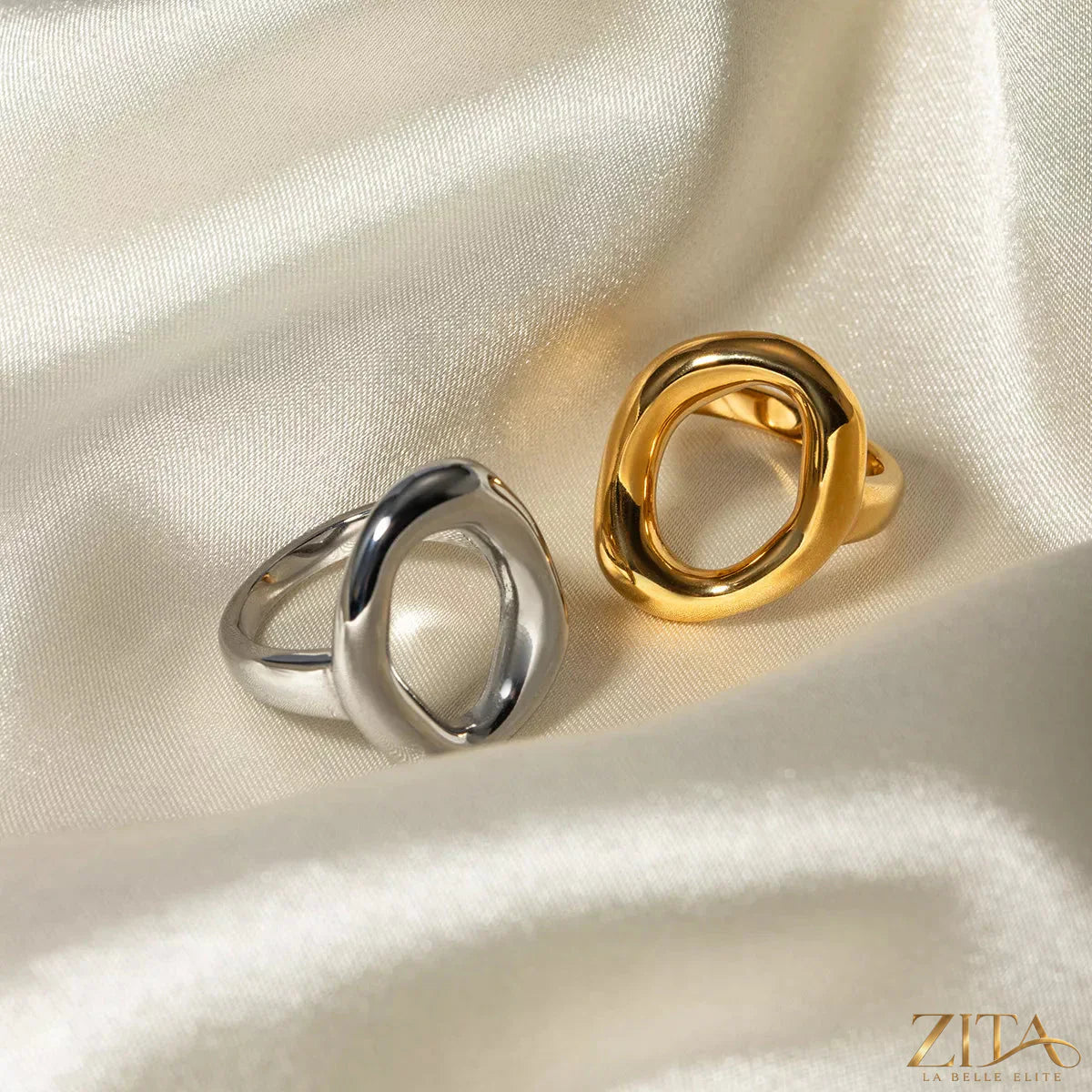 Silver modern hollow oval ring by Zita La Belle Elite featuring a sleek, minimalist design and smooth oval shape.
