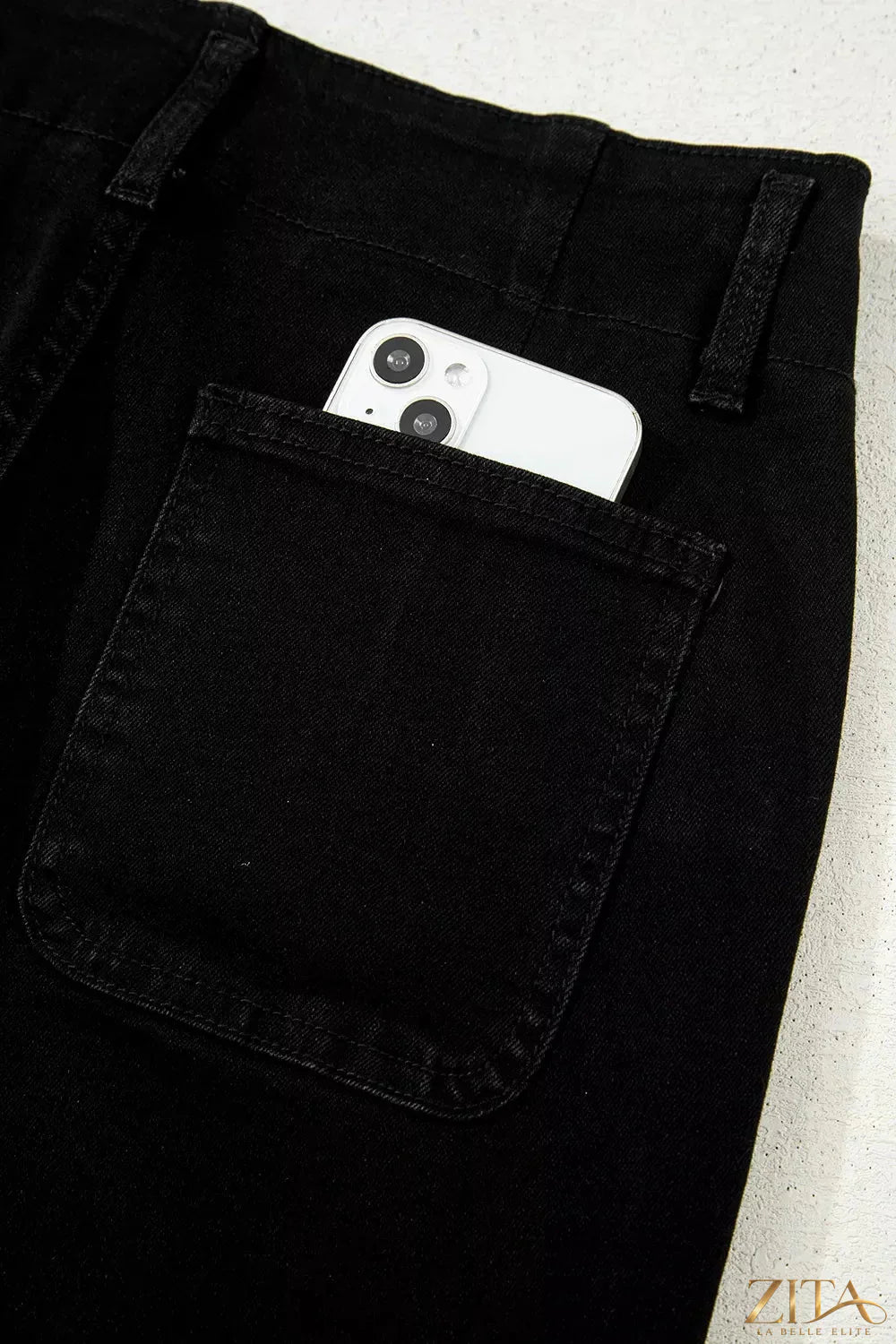 Pair of Zita La Belle Elite high waist flared bottom jeans with 2 buttons, showcasing a stylish retro denim look.