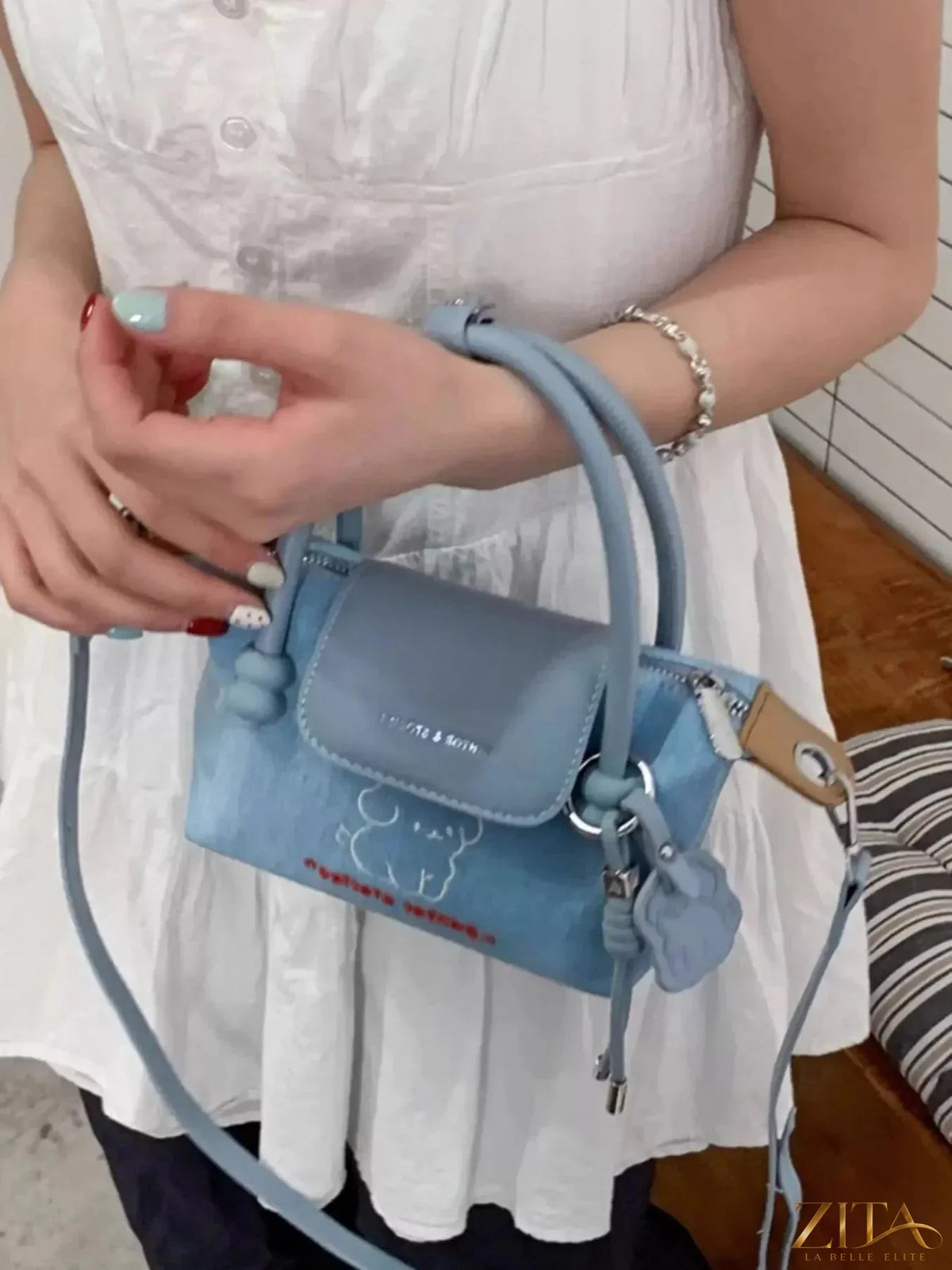 Zita La Belle Elite puppy embroidered denim handbag with floral details and top handles, stylish accessory for casual outfits.