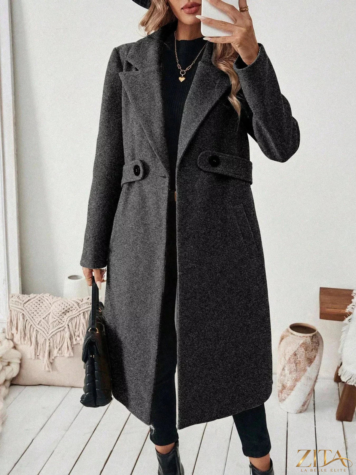 Zita La Belle Elite one-button lapel collar overcoat displayed on a hanger, showcasing its tailored design and classic style.