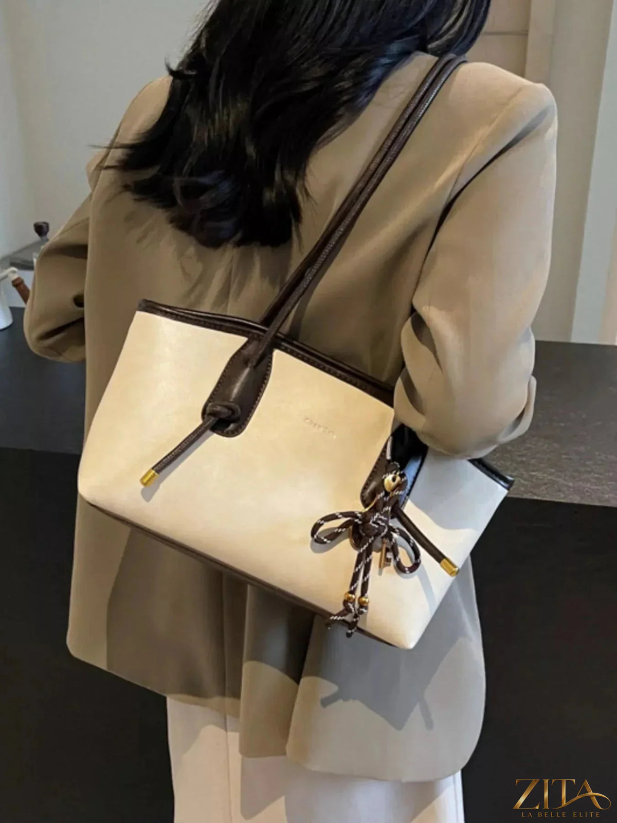 Two-tone Zita La Belle Elite shoulder bag with adjustable strap and sleek design, shown on a plain background.