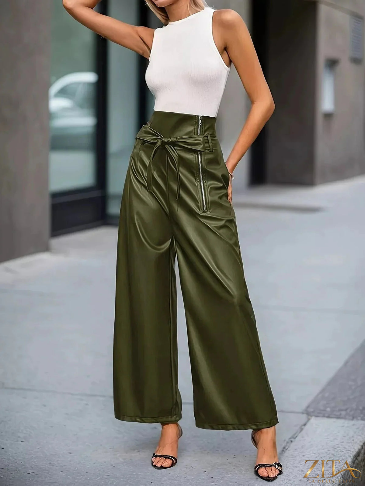High-waisted faux leather tie-waist wide-leg pants by Zita La Belle Elite, showing the sleek design and stylish fit.
