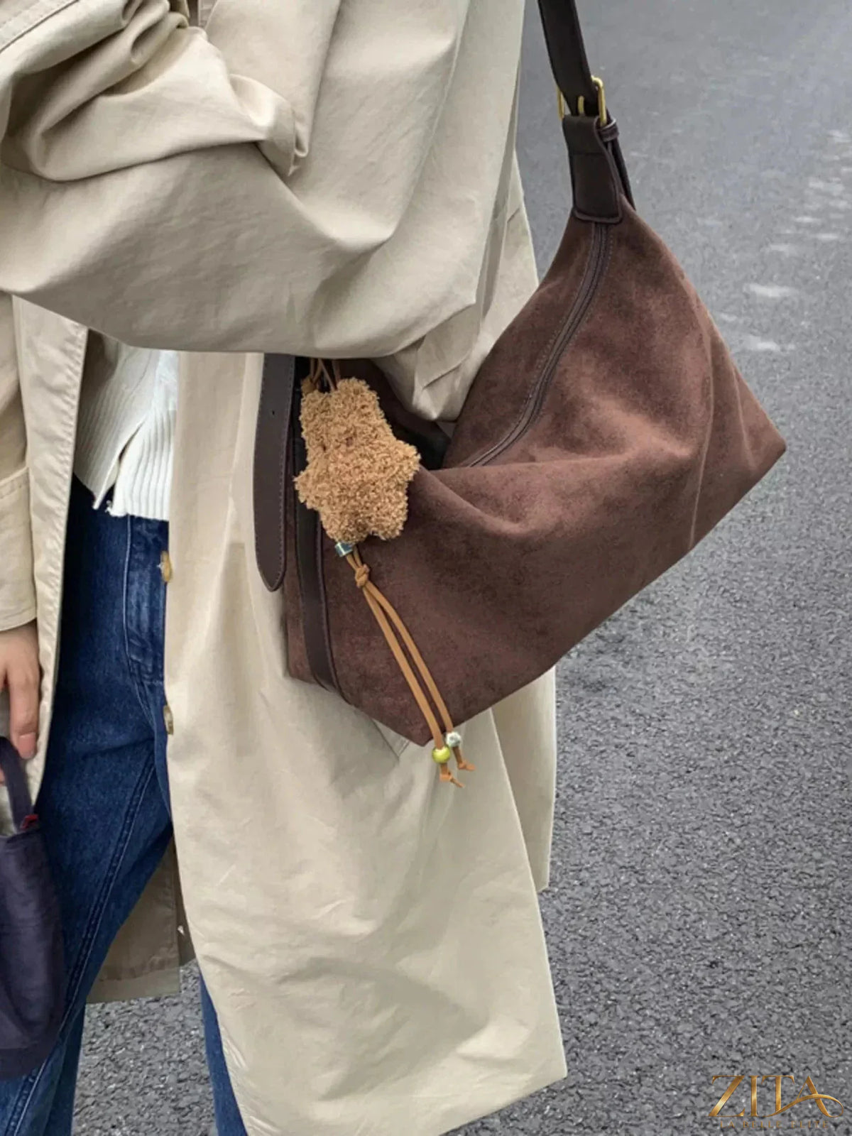 Zita La Belle Elite solid color suede hobo crossbody bag with adjustable strap and minimalist design on neutral background