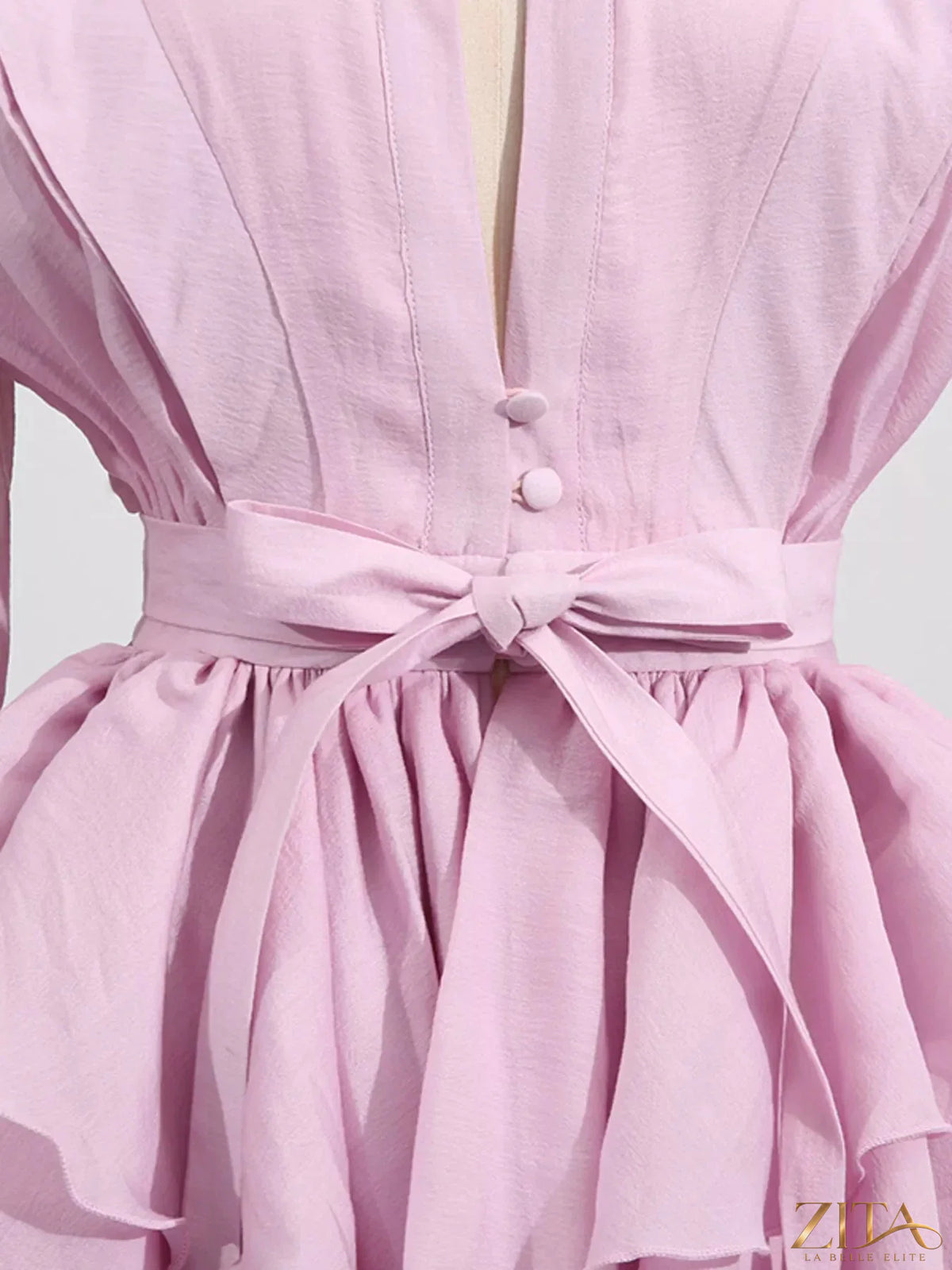 Ruffled long sleeve mini dress by Trendsi featuring a feminine silhouette and delicate ruffle details.