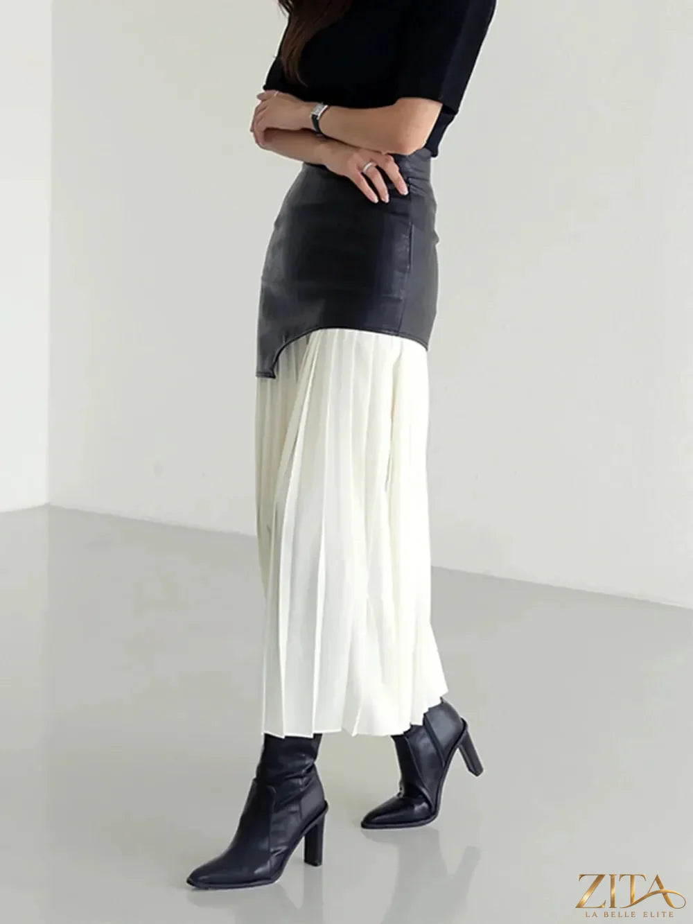 Pleated contrast high-rise skirt from Trendsi featuring a stylish pleated design and a flattering high waist.