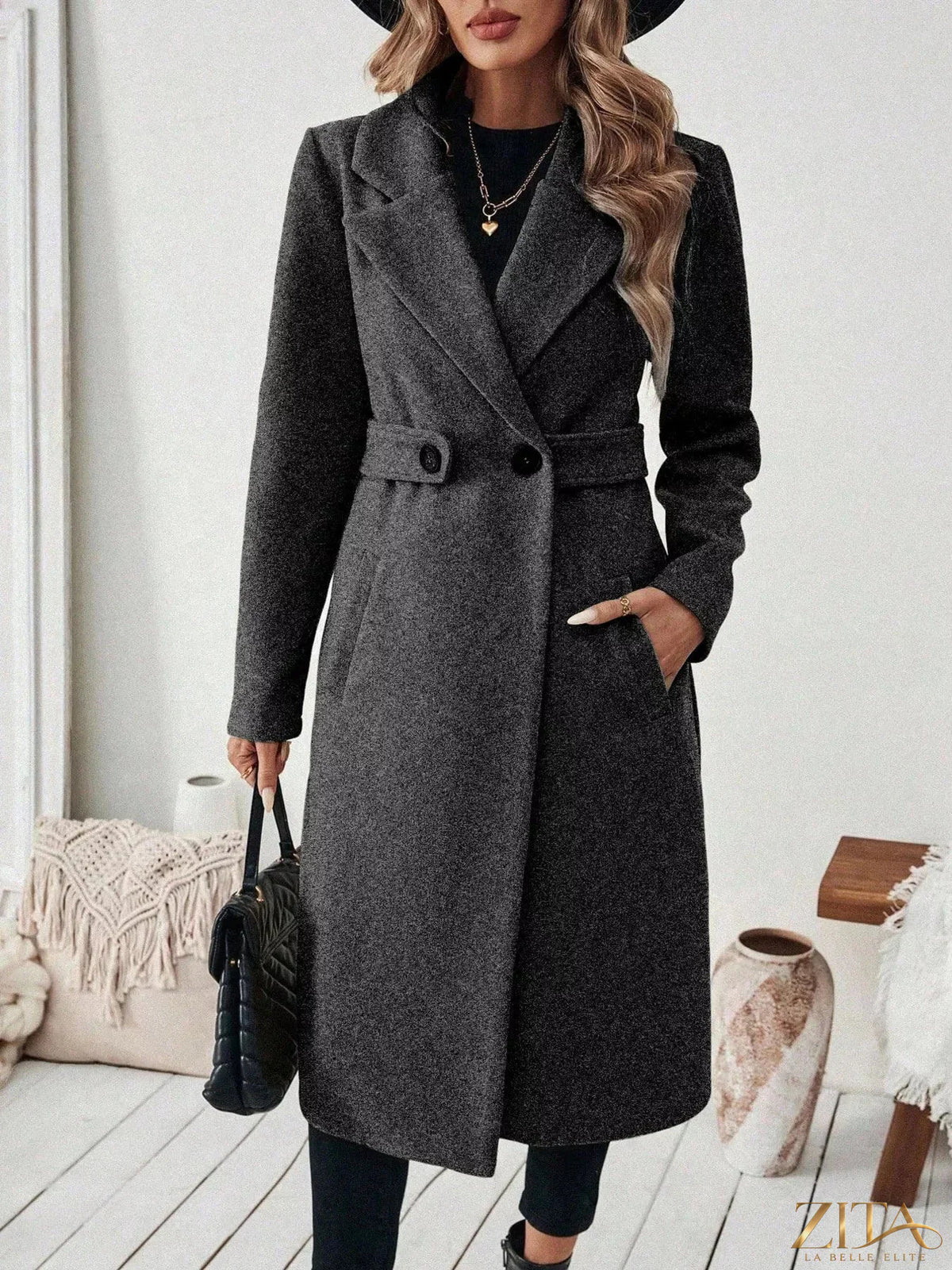 Zita La Belle Elite one-button lapel collar overcoat displayed on a hanger, showcasing its stylish design and tailored fit.