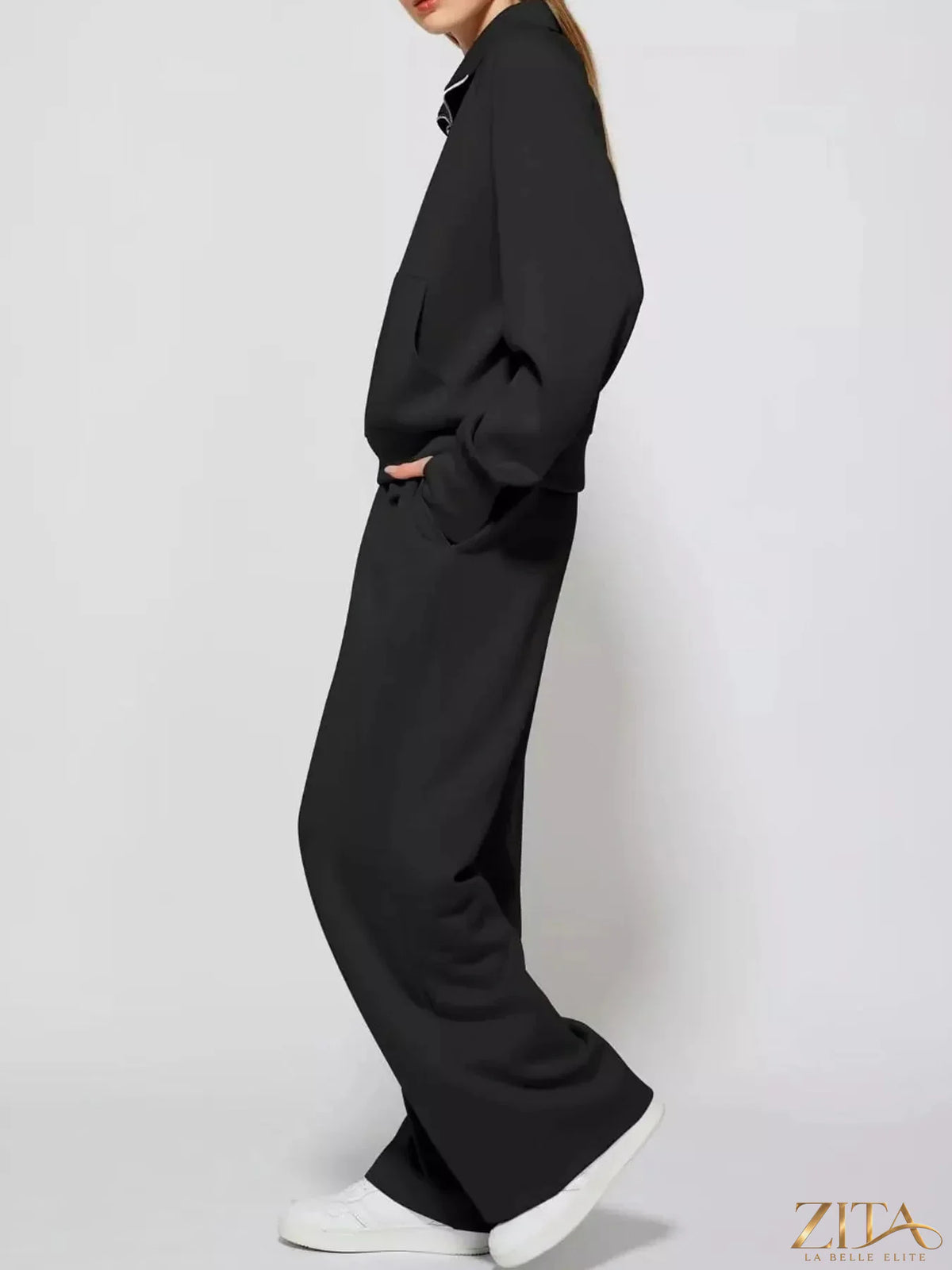 Zita La Belle Elite half-zip sweatshirt and wide-leg pants set, in soft fabric, shown in a casual indoor setting.