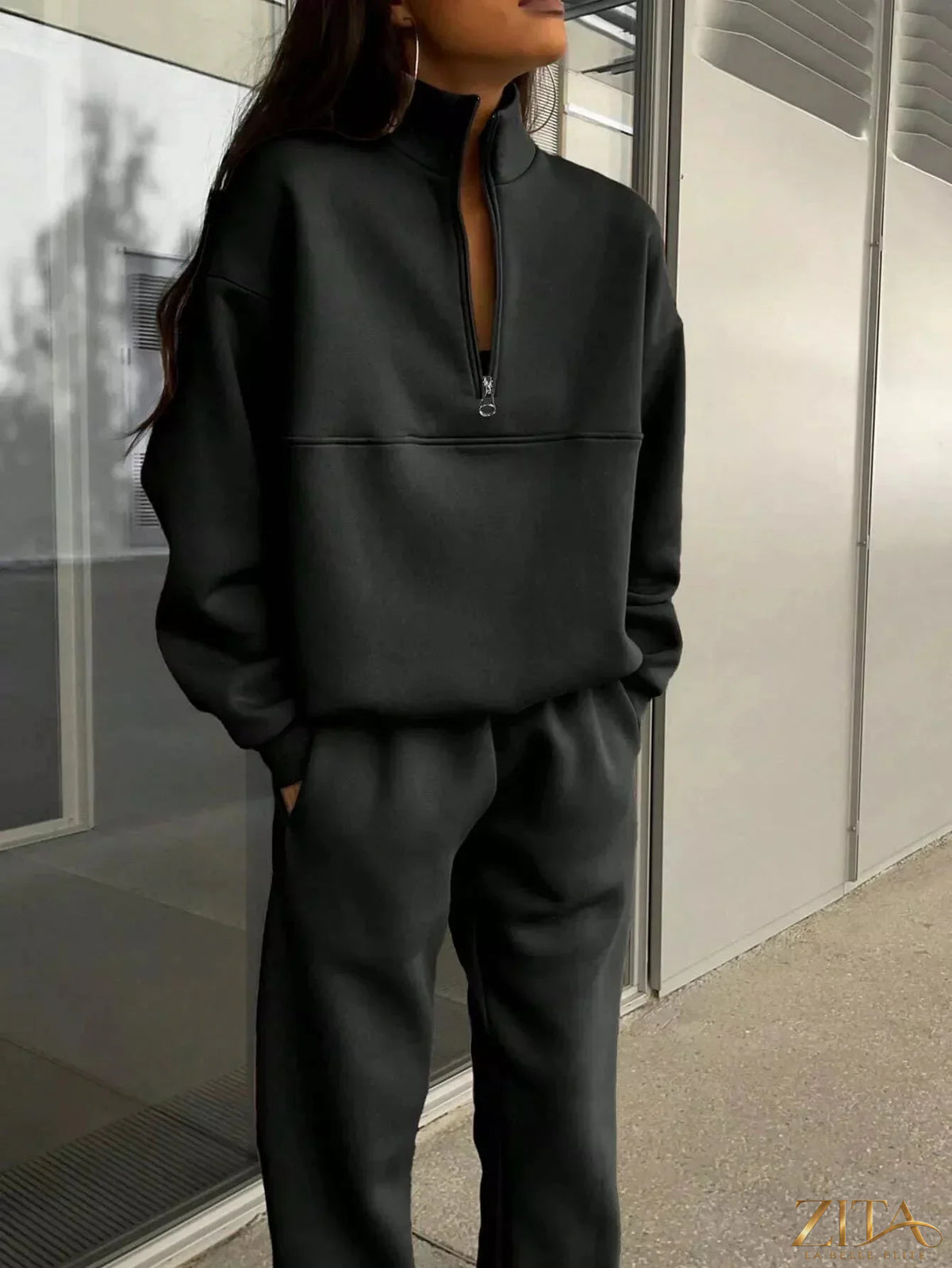 Zita La Belle Elite half zip sweatshirt and matching pants set in soft fabric, shown in a stylish casual pose.