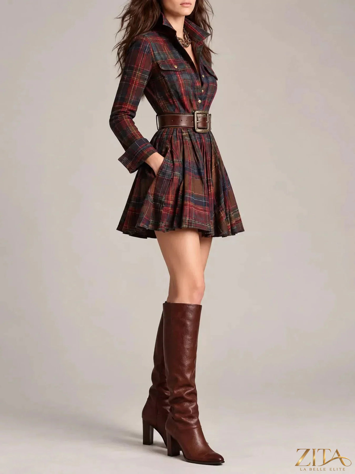 Zita La Belle Elite plaid long-sleeve shirt dress hanging on a hanger, featuring a classic checkered pattern and button front.