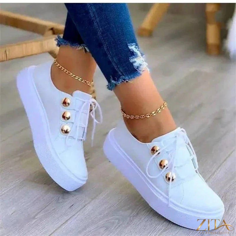 Zita La Belle Elite round toe platform sneakers in white with chunky sole and lace-up front on a plain background.