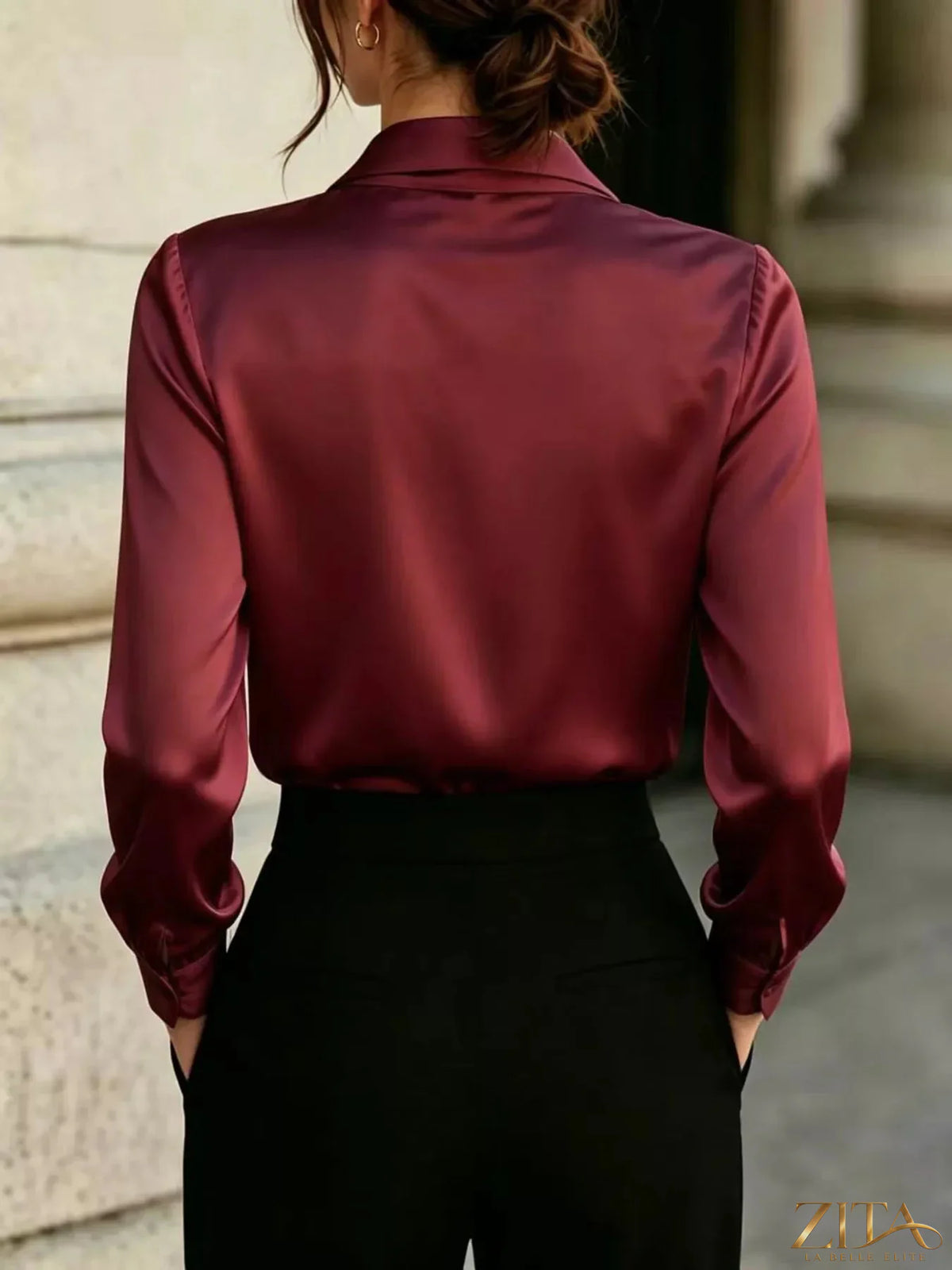 Zita La Belle Elite satin blouse with front tie detail, featuring a stylish and elegant design in a smooth, shiny fabric.