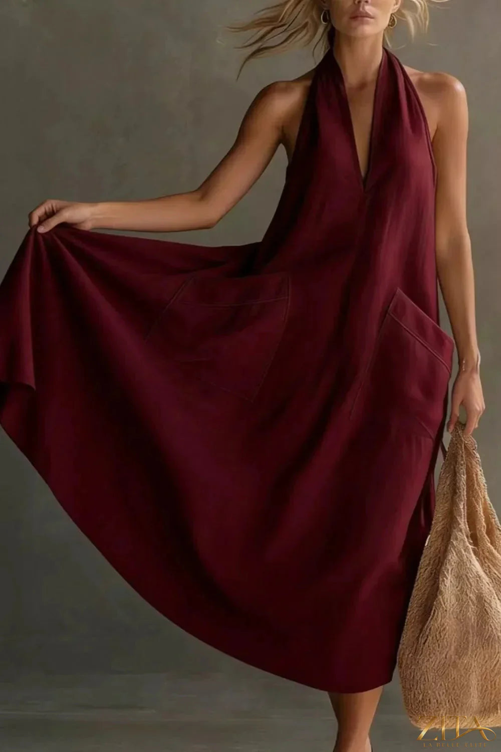 Zita La Belle Elite casual halter neck midi dress with side pockets, lightweight fabric, in a relaxed, stylish design.