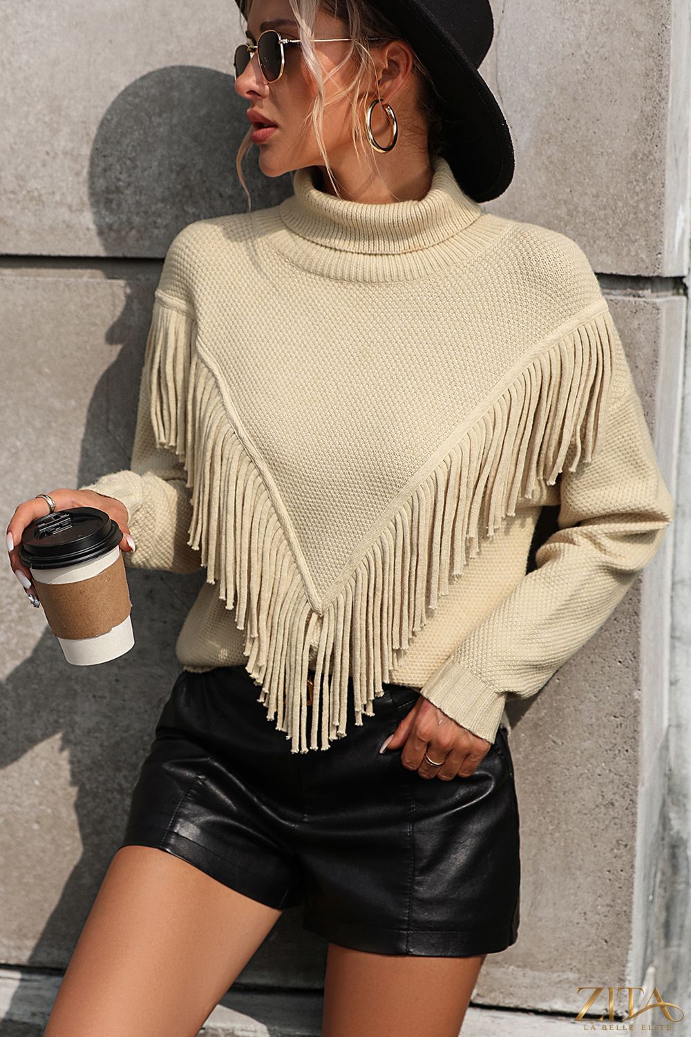Turtle neck tassel front long sleeve pullover sweater by Trendsi, featuring a cozy design with tassels on the front.