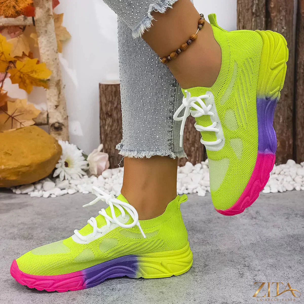 Zita La Belle Elite lace-up round toe sneakers in white with black accents, featuring a casual athletic design and textured rubber sole.