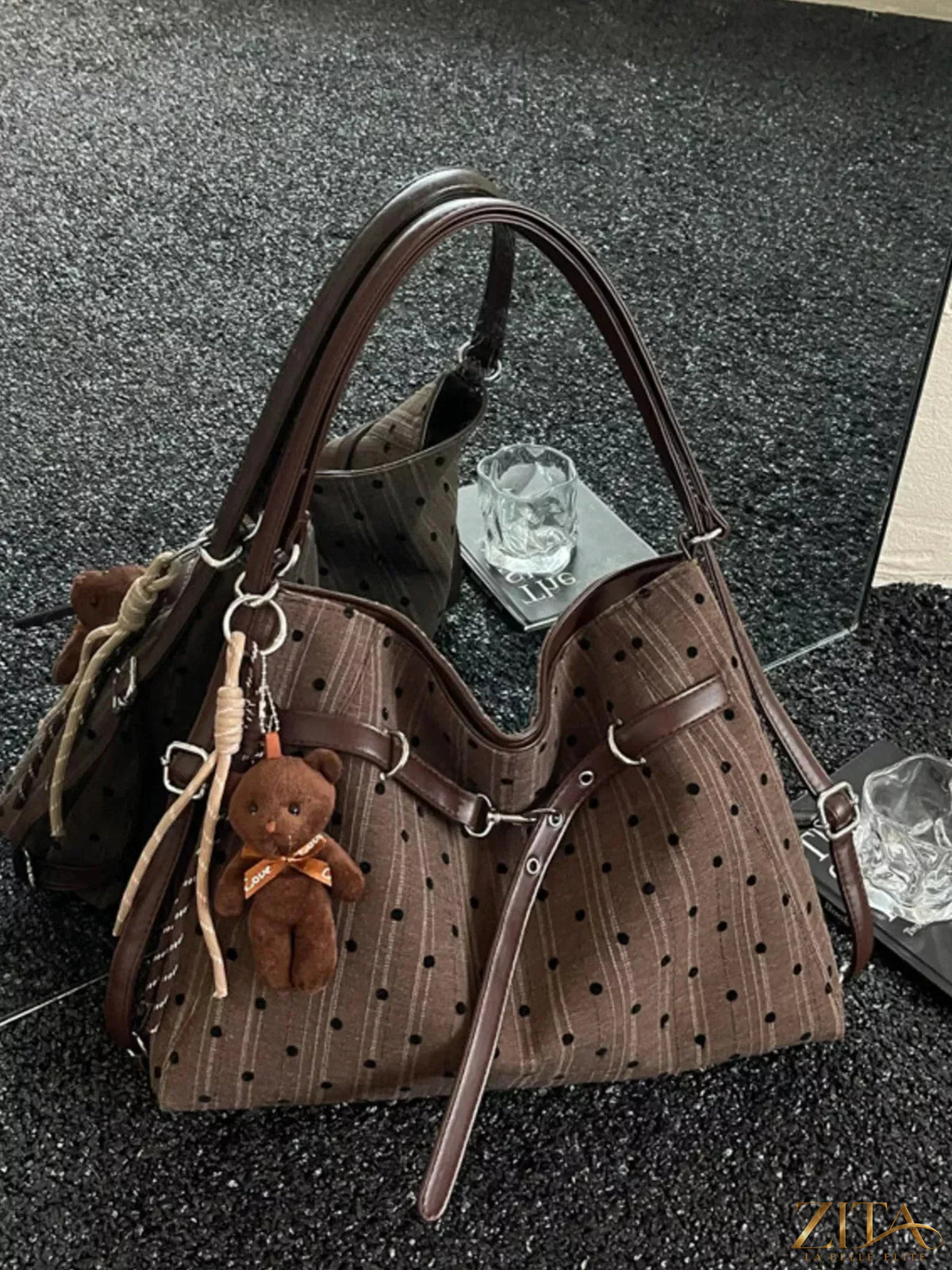 Zita La Belle Elite polka dot shoulder bag with adjustable strap and stylish design, perfect for casual or evening wear.
