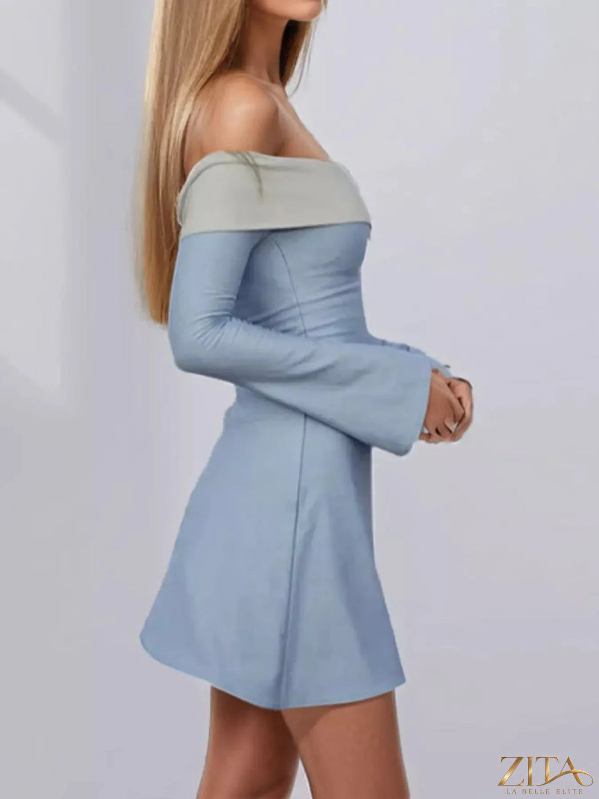 Zita La Belle Elite off-shoulder flare sleeve mini dress with a fitted bodice and ruffled hem, perfect for stylish occasions.